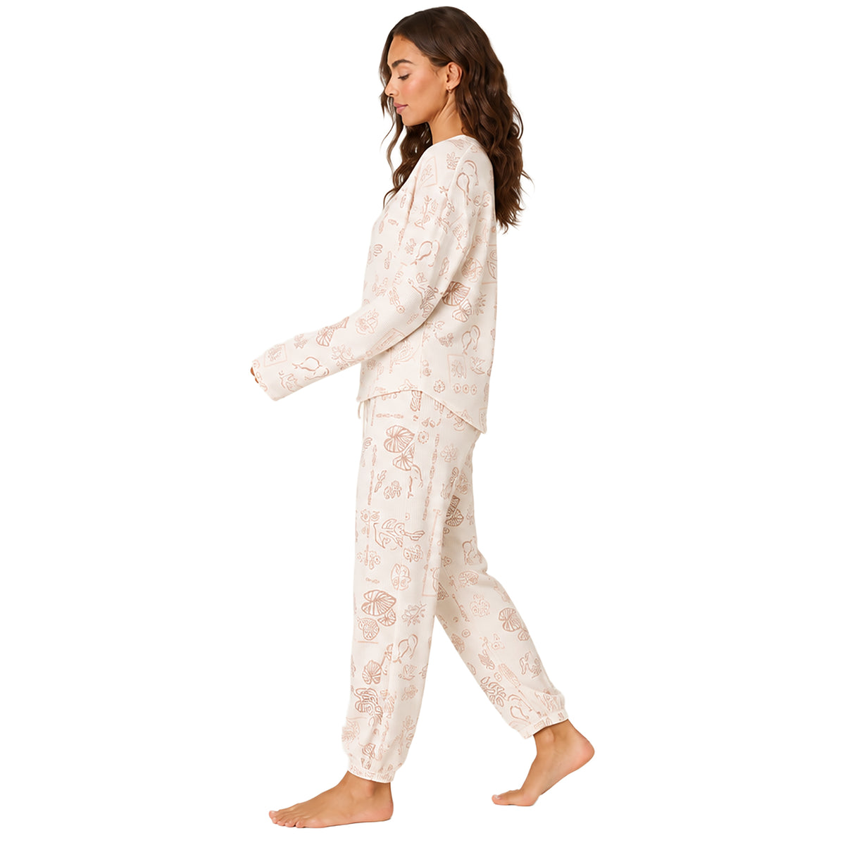 Women's ivory waffle knit lounge top with a soft tropical print paired with warm taupe drawstring lounge shorts featuring embroidered palm trees.
