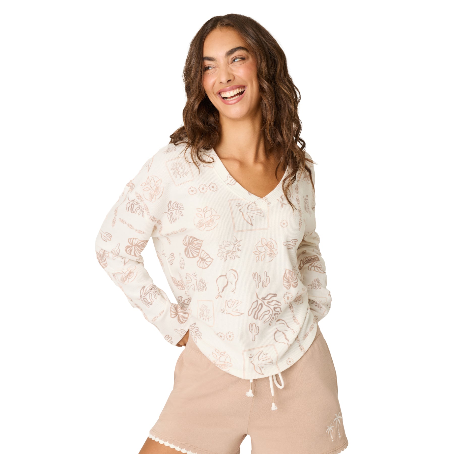 Women's ivory long sleeve waffle knit lounge top with a relaxed fit, V-neckline, and tropical print paired with warm taupe lounge shorts.