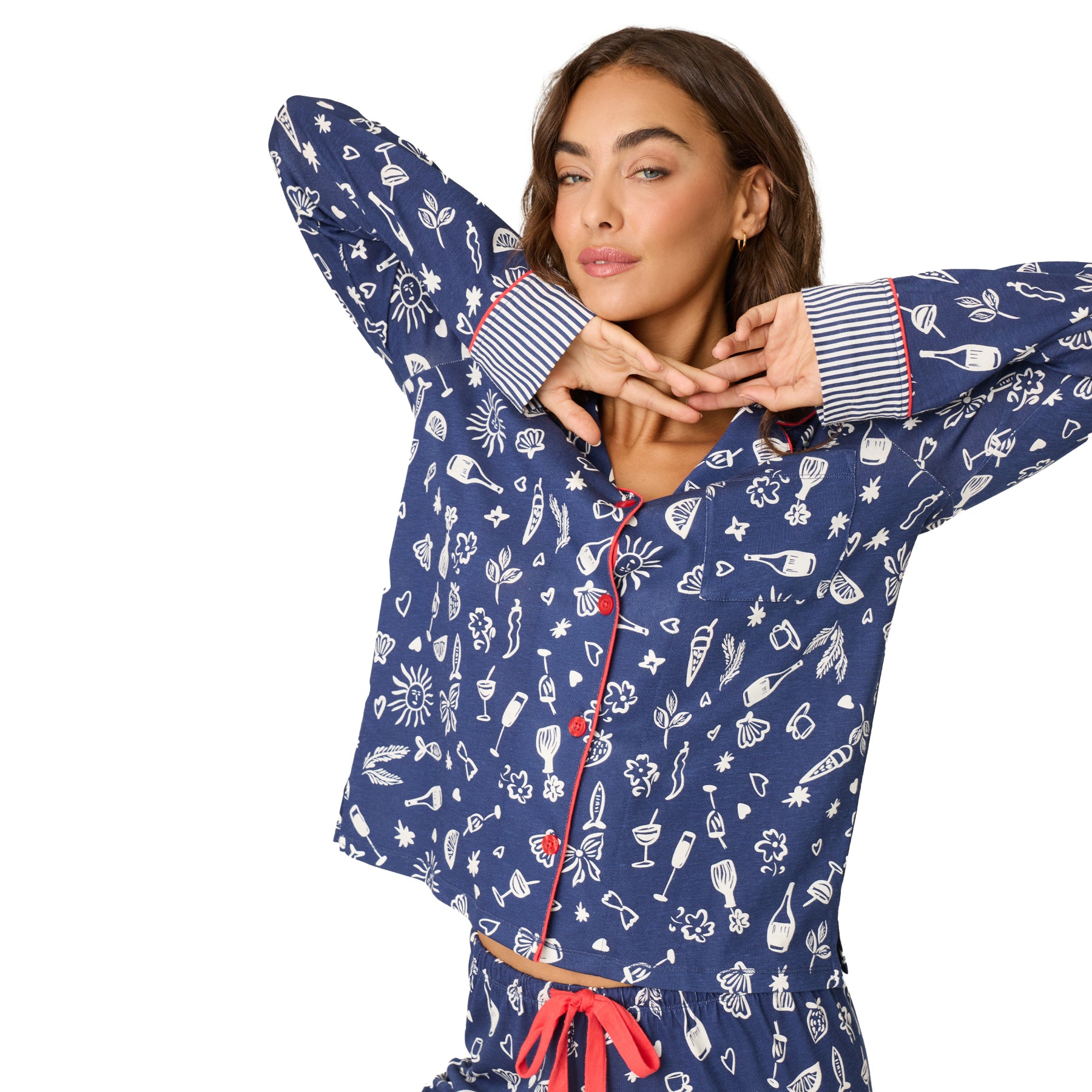 Close-up of PJ Salvage navy Italy print PJ set with contrast piping and striped cuffs.