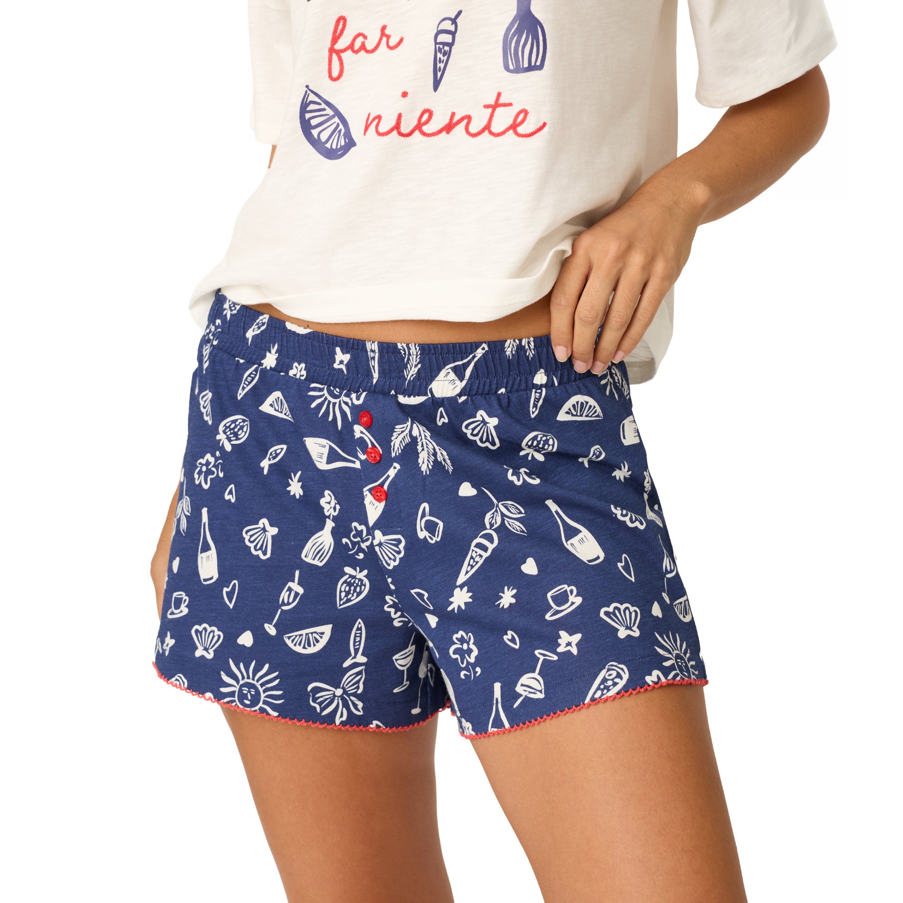 Close-up of PJ Salvage navy sleep shorts featuring whimsical Italian summer motifs, coral buttons, and delicate scalloped trim.
