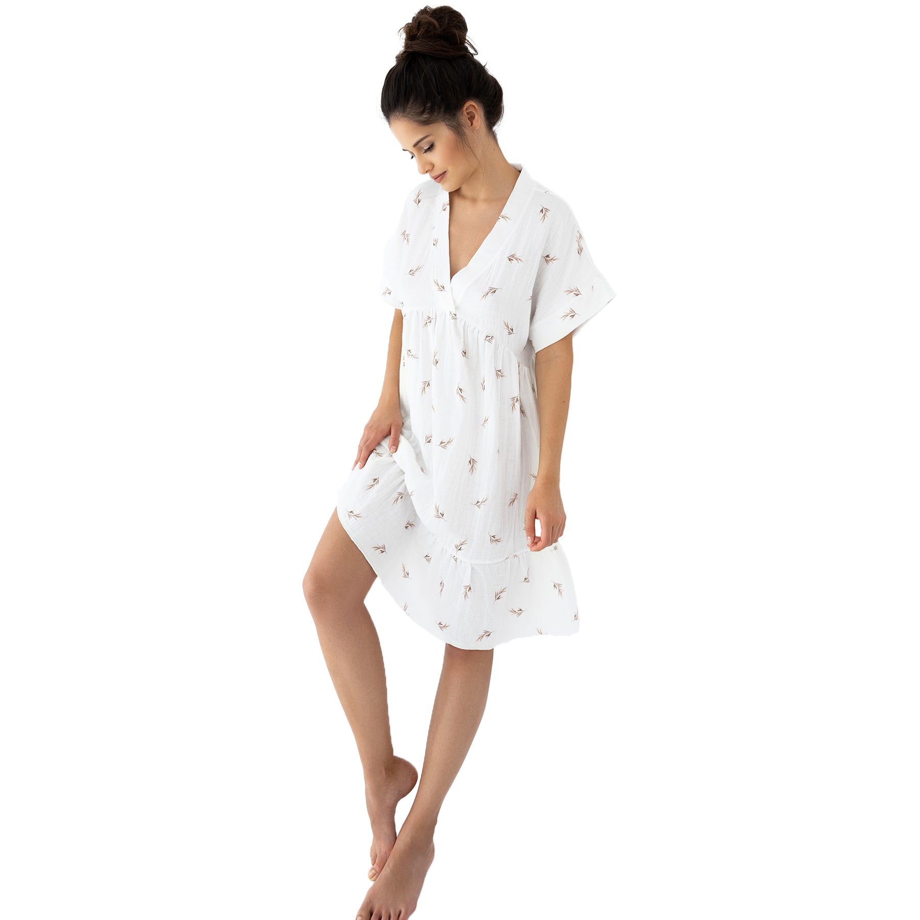 Ivory short-sleeve nightdress with soft taupe leaf print and tiered hem, styled with relaxed elegance