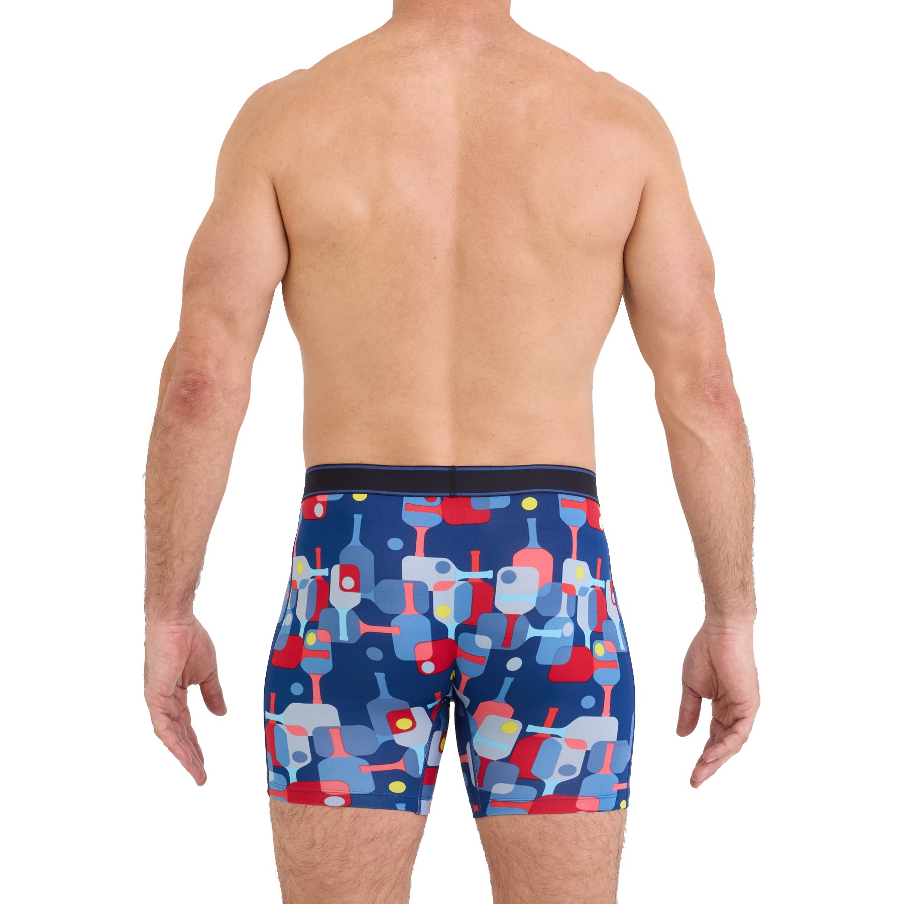 SAXX Pickle Paddle Navy boxer brief with vibrant pickleball paddle print, back view on model.