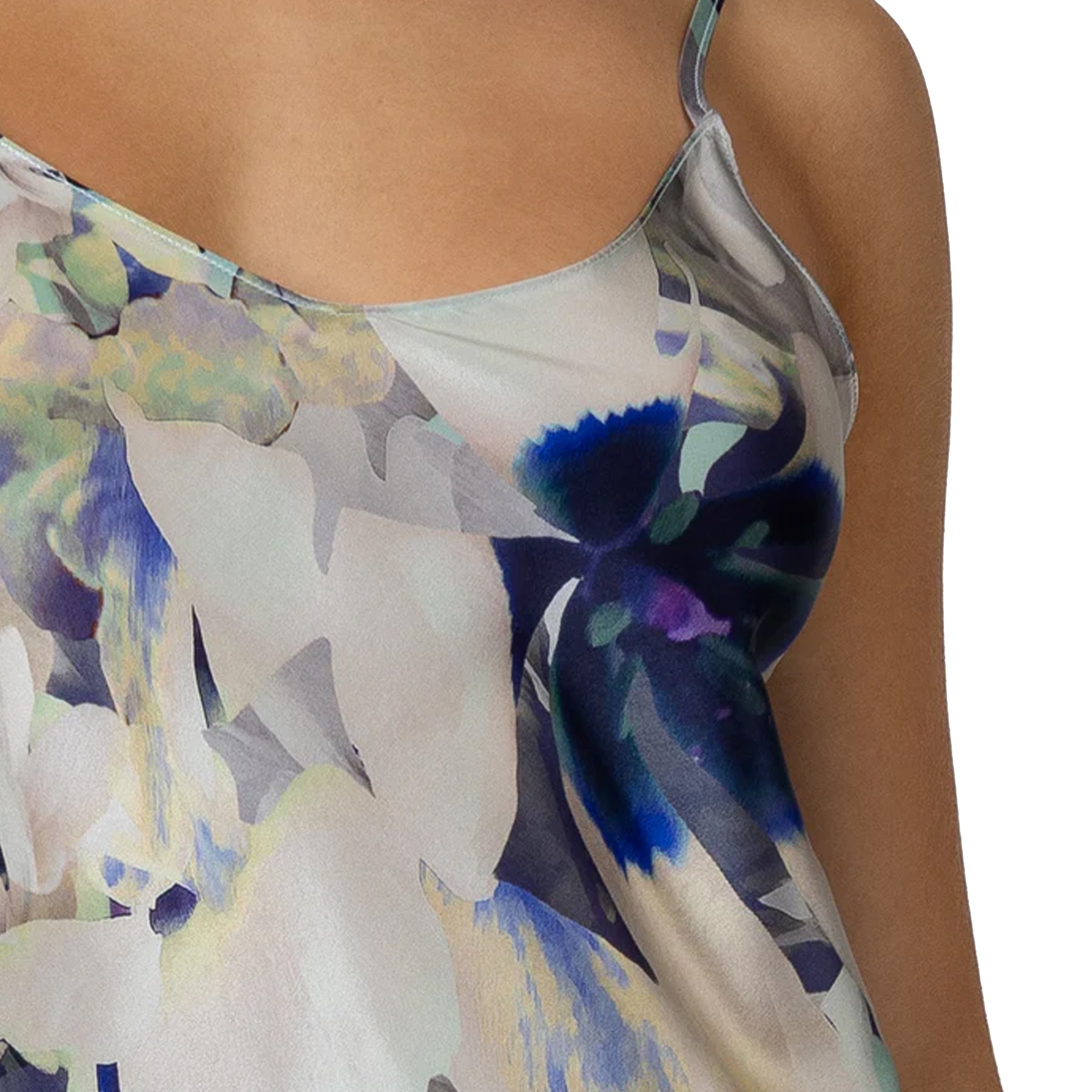 Close-up of tranquil print satin chemise showcasing soft floral artwork and luxurious silky texture.
