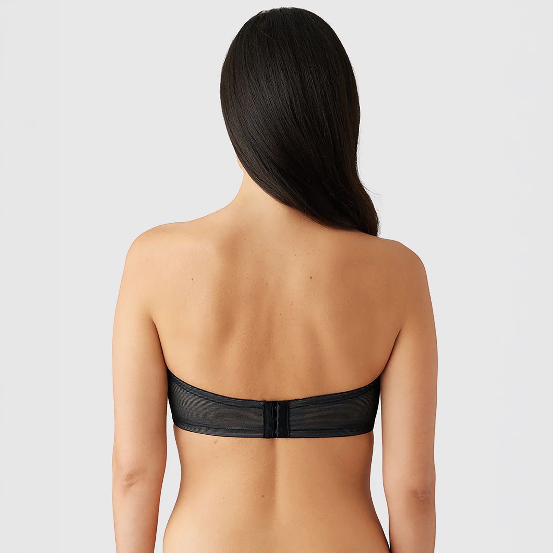 Back view of Wacoal 854310 Minimizing Strapless Bra in Black with wide smoothing band and stay-put support.