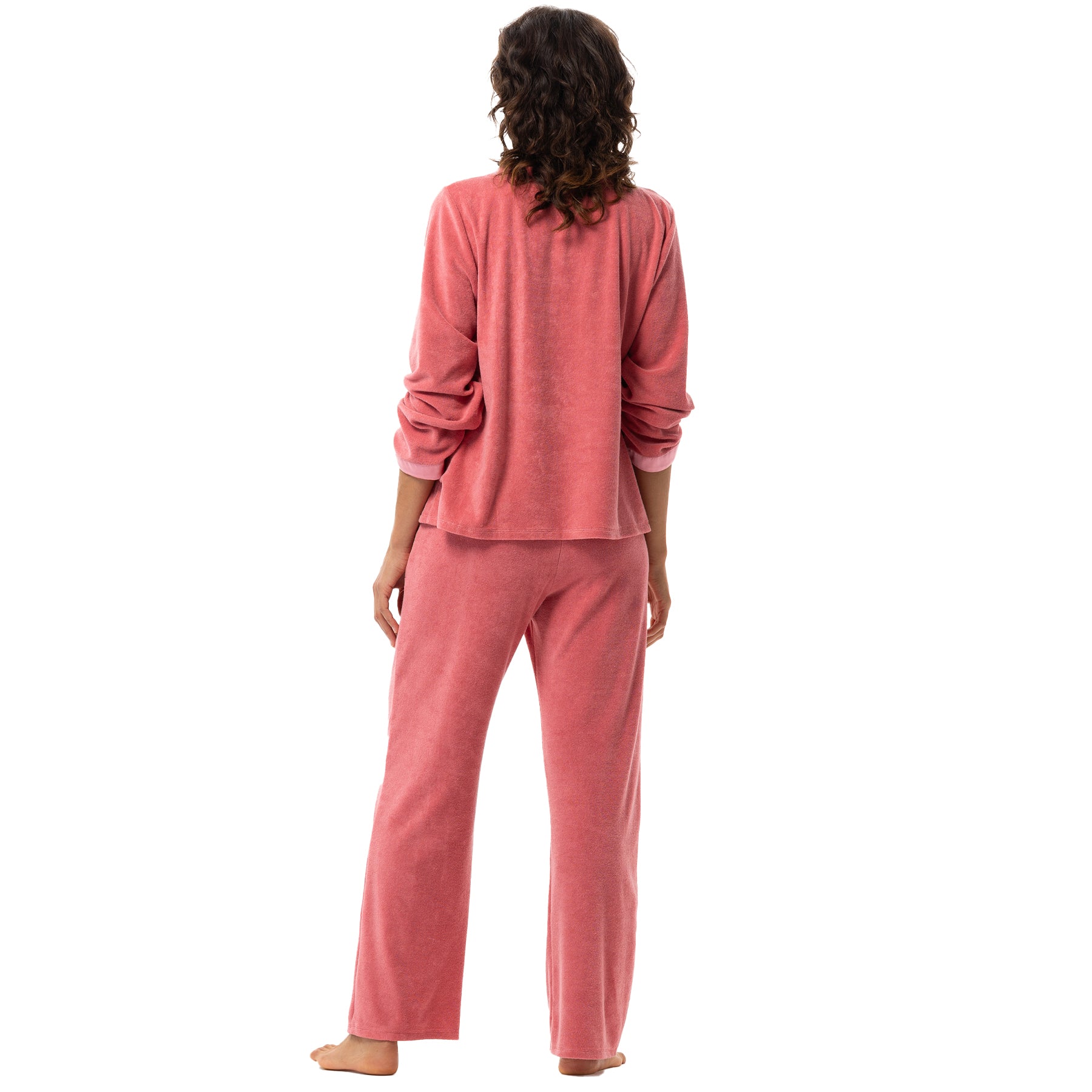 Back view of pink velour pyjama set with relaxed silhouette