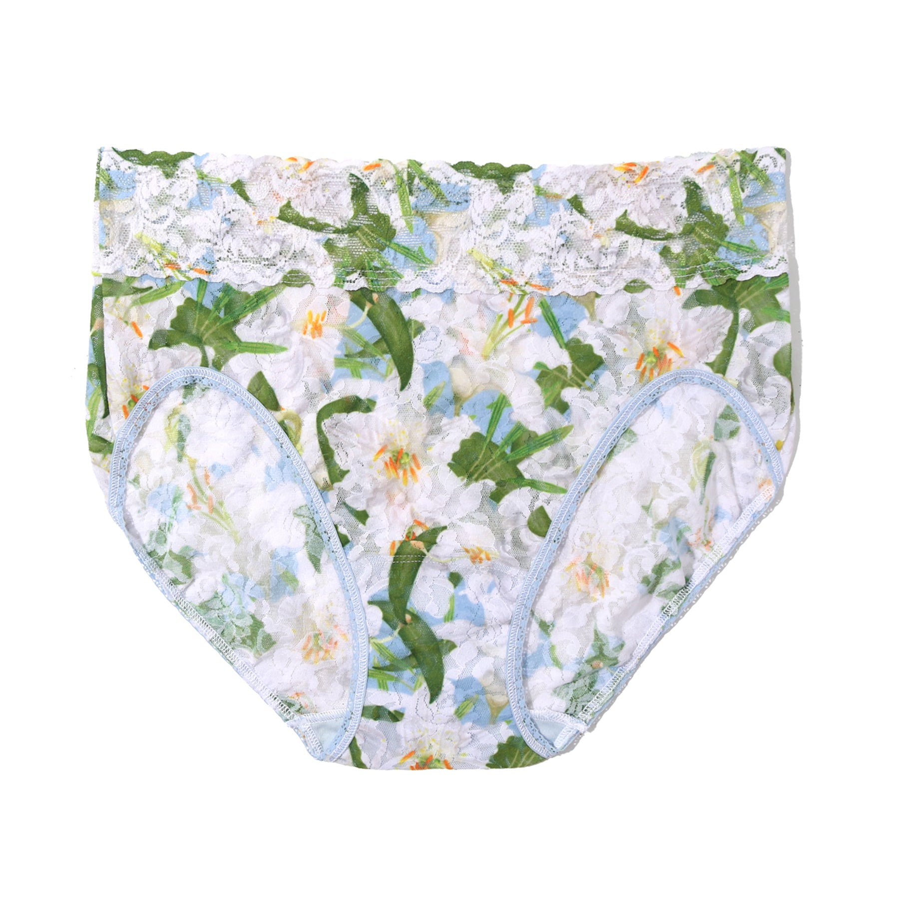 Flat lay of floral lace brief in white with green lily print, blue trim, and scalloped waistband