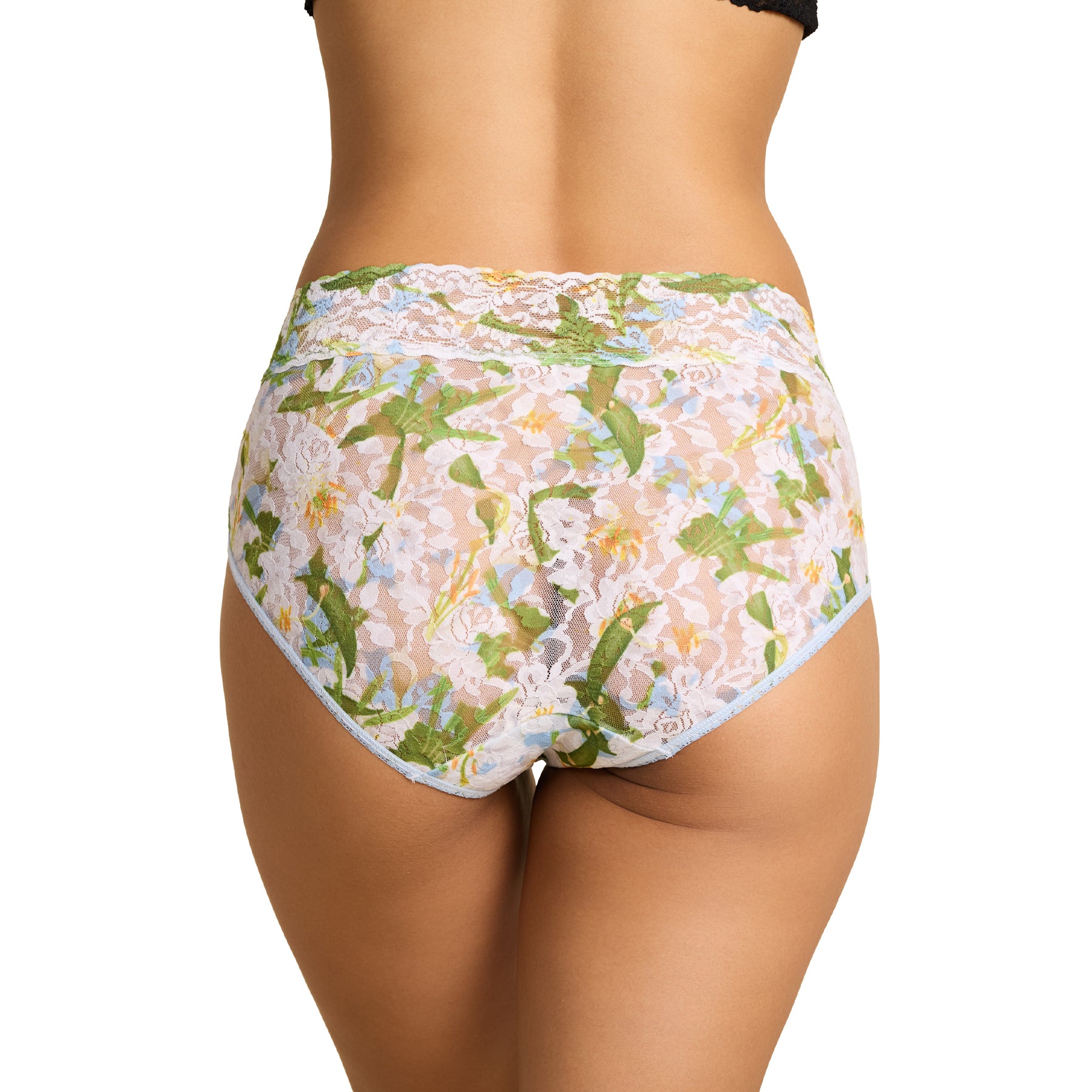 Back view of floral lace brief on model, showcasing full coverage and sheer lace detail