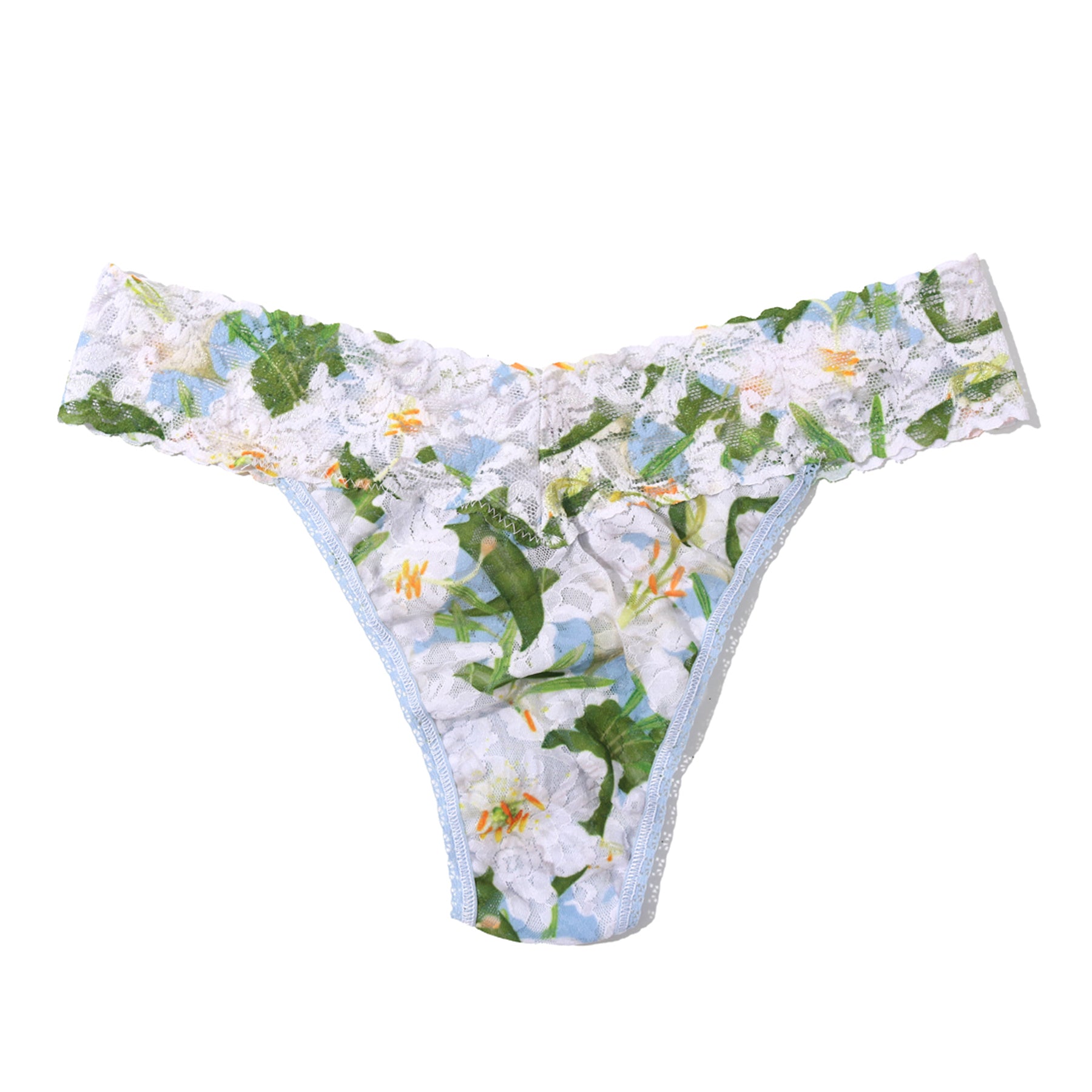 Floral lace thong laid flat, featuring white lace with green leaves and soft blue accents