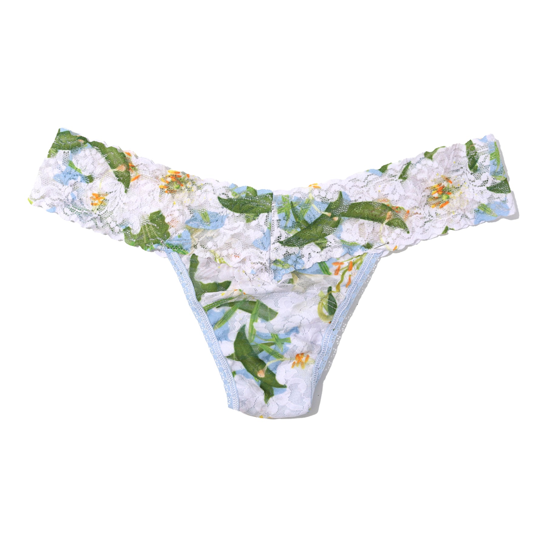 Flat lay of floral lace thong in white lace with green leaves, blue accents, and delicate scalloped trim
