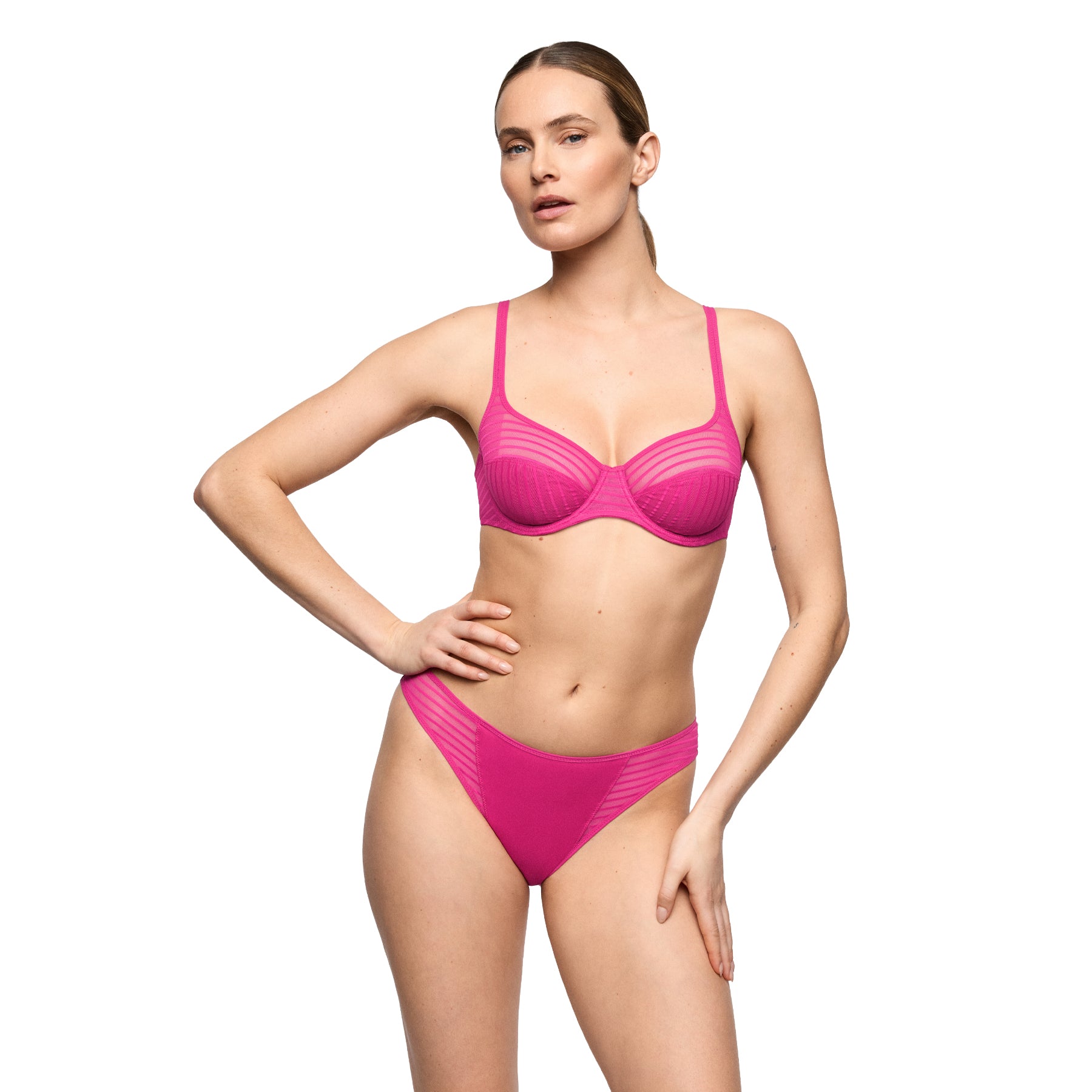 Model wearing the Marie Jo Tom lingerie set in Very Berry featuring a sheer striped balcony bra and matching bikini briefs.
