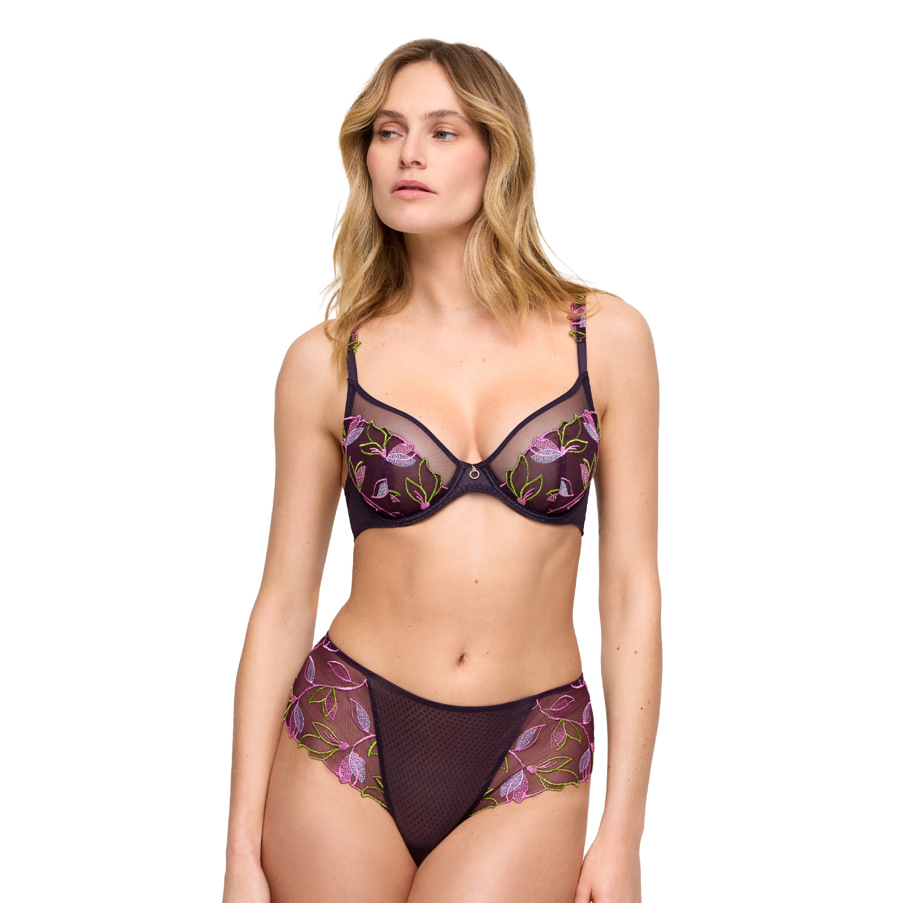 Model wearing the embroidered plunge bra and coordinating high-waisted brief with vibrant floral details.