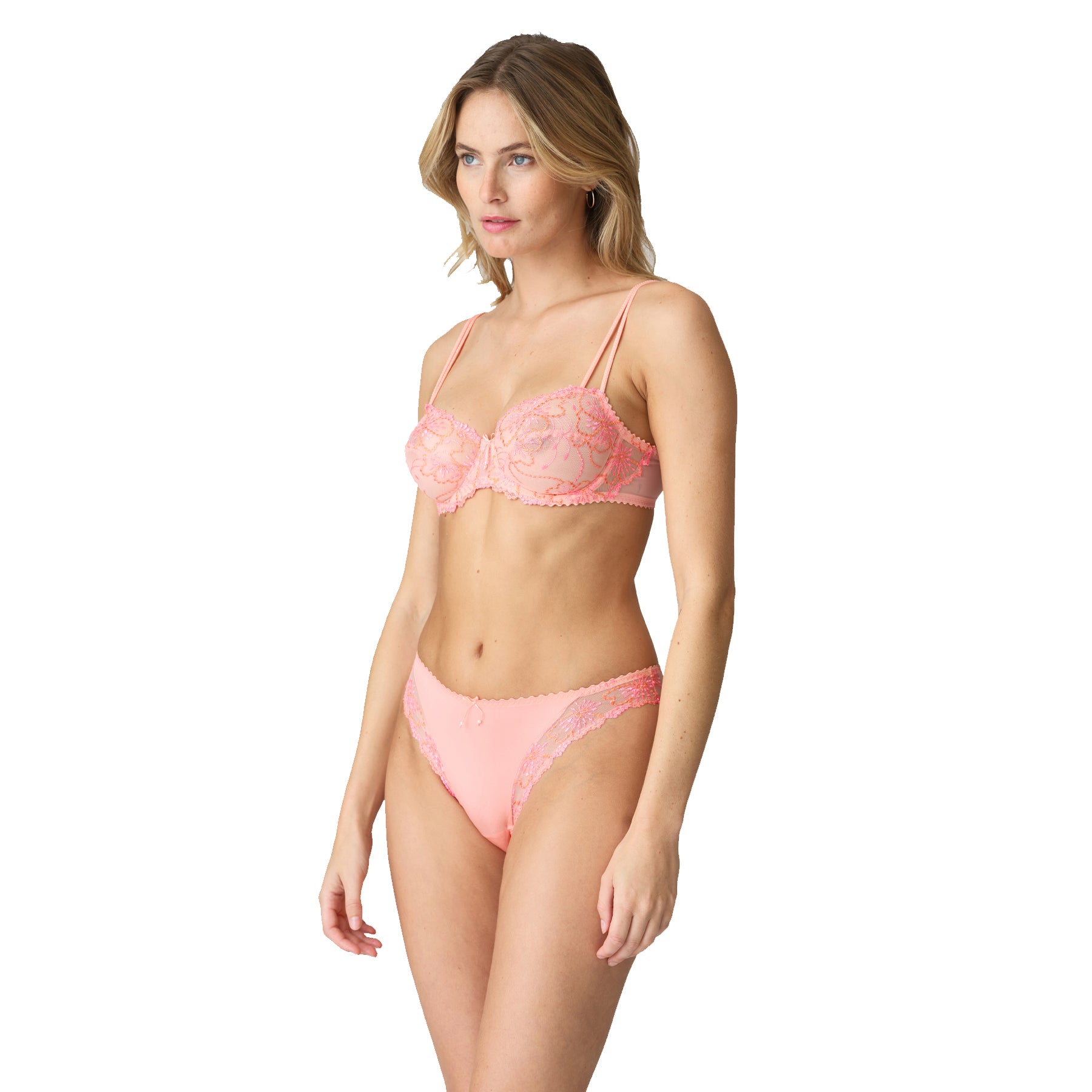 A model wearing a aon-padded balcony bra with a horizontal seam and low-cut cups with a comfy double lining, close-up view. Cheerful mix of orange and pink.