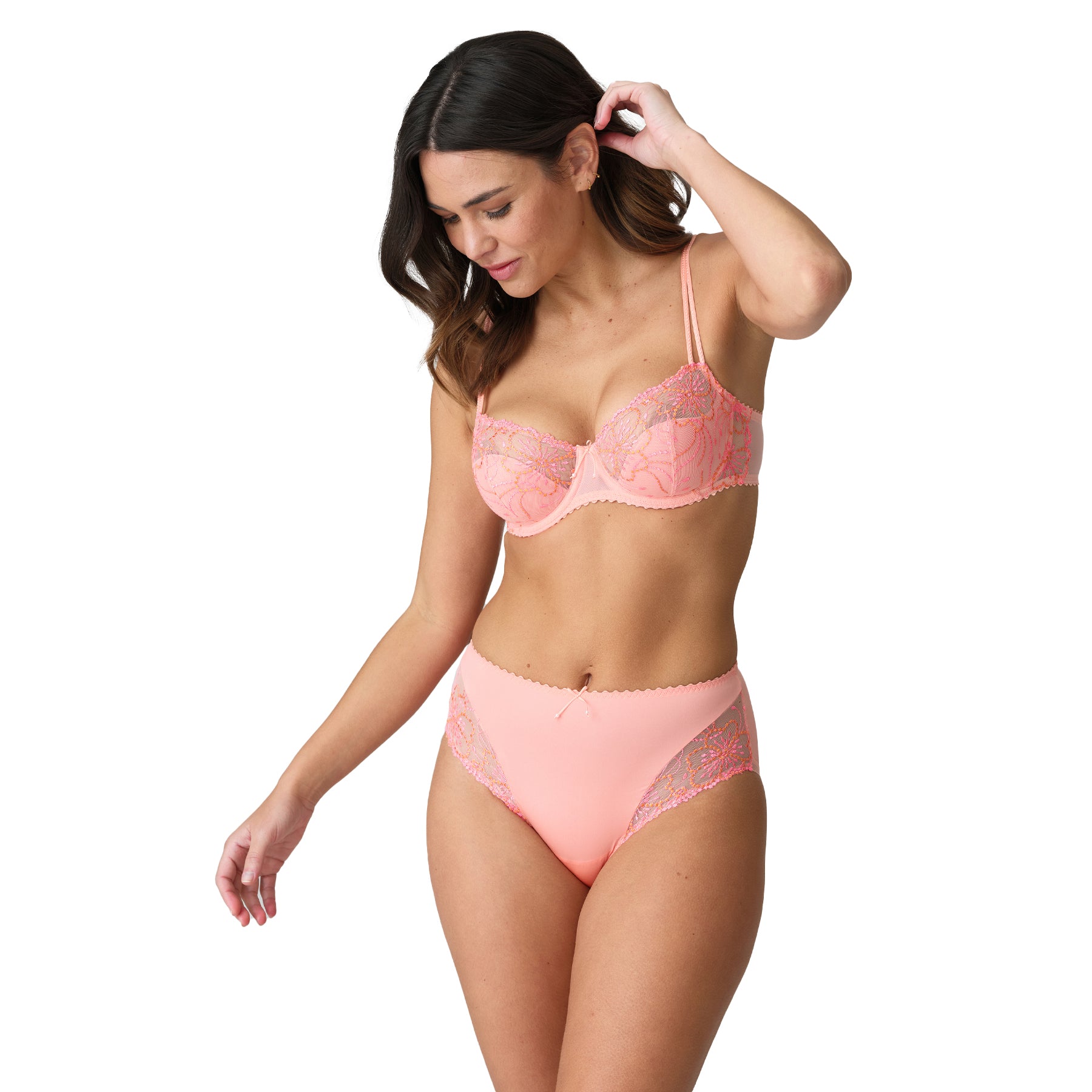 A model showing Marie Jo Florida Bra in peachy pink.