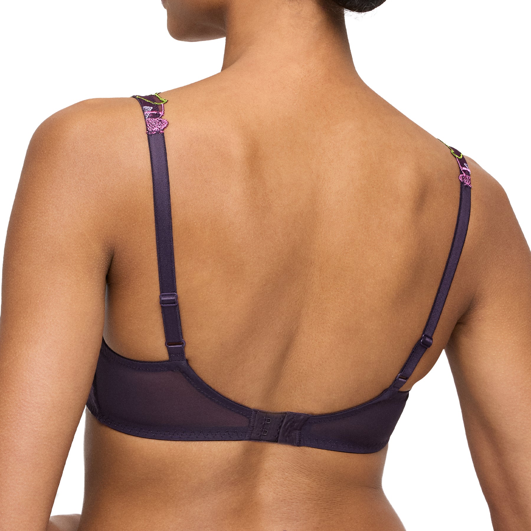 Back view of model wearing plum bra with adjustable straps and mesh band