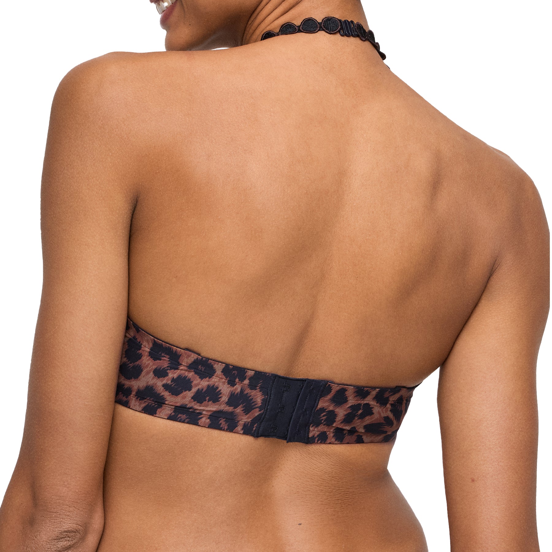 Leopard print bra back view on model with adjustable hook closure.