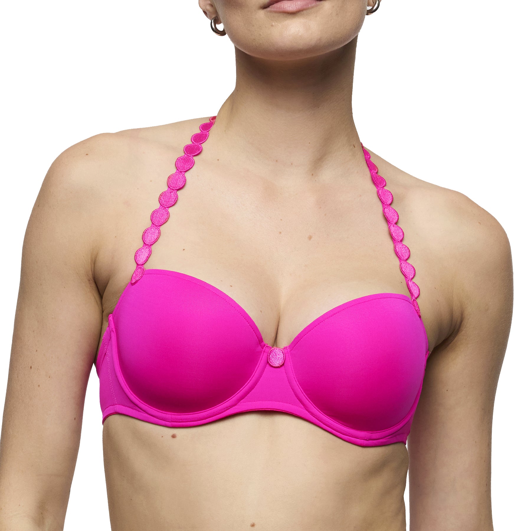 Front view of influencer pink padded balcony bra with smooth cups and decorative scalloped straps