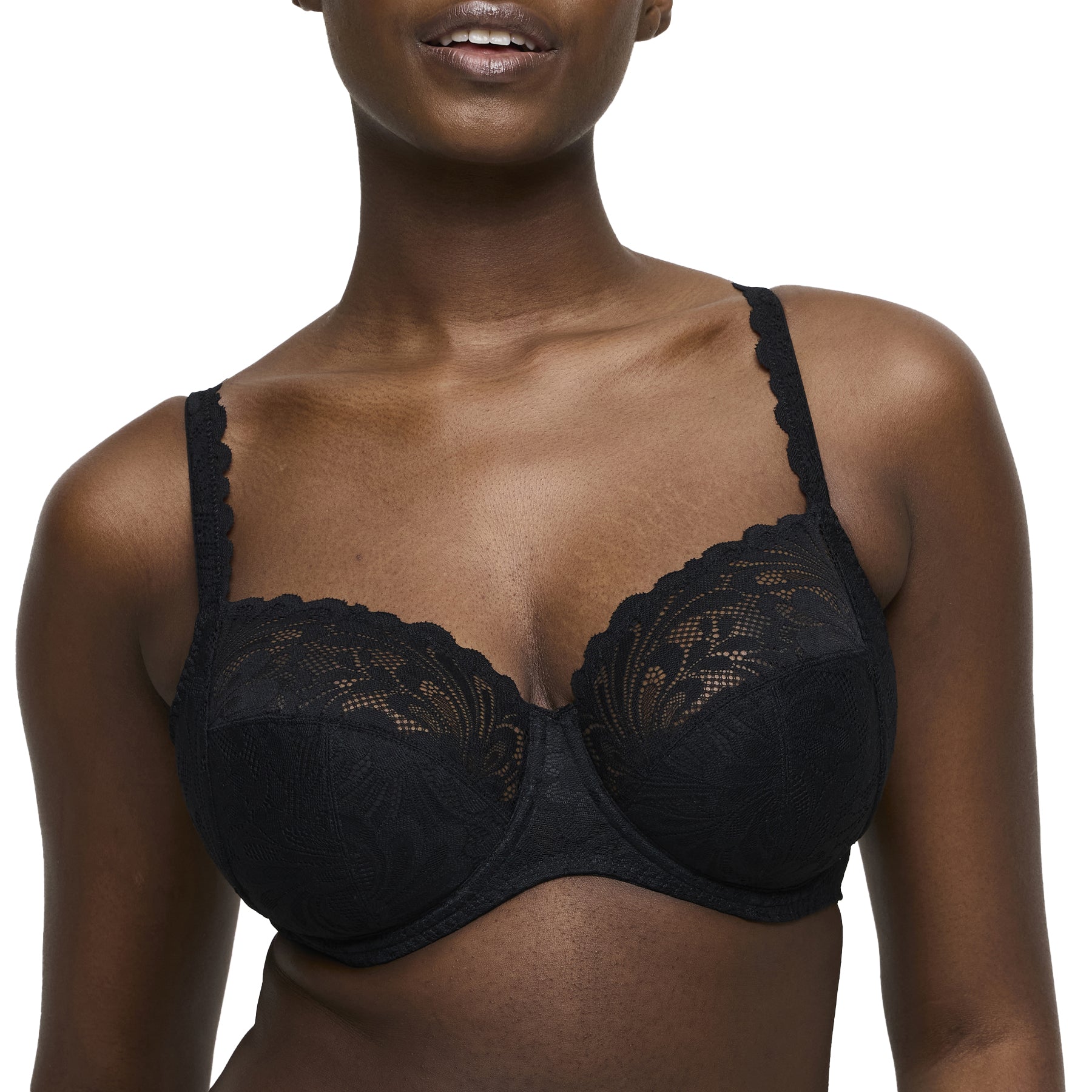 Close-up of black lace underwired bra on model, front angle.