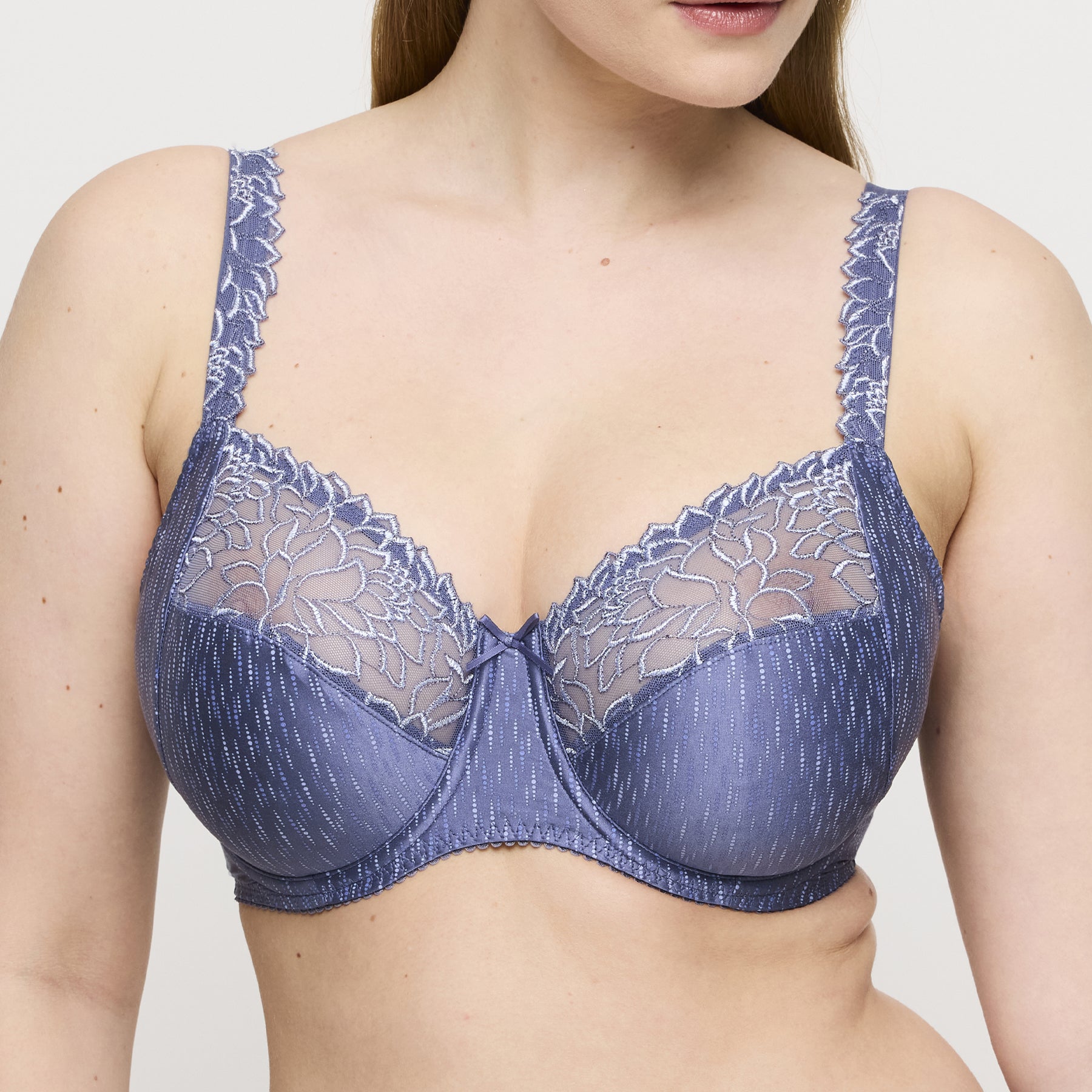 Frontal close-up of underwire full cup bra in nightshadow blue with sheer embroidered upper cups.