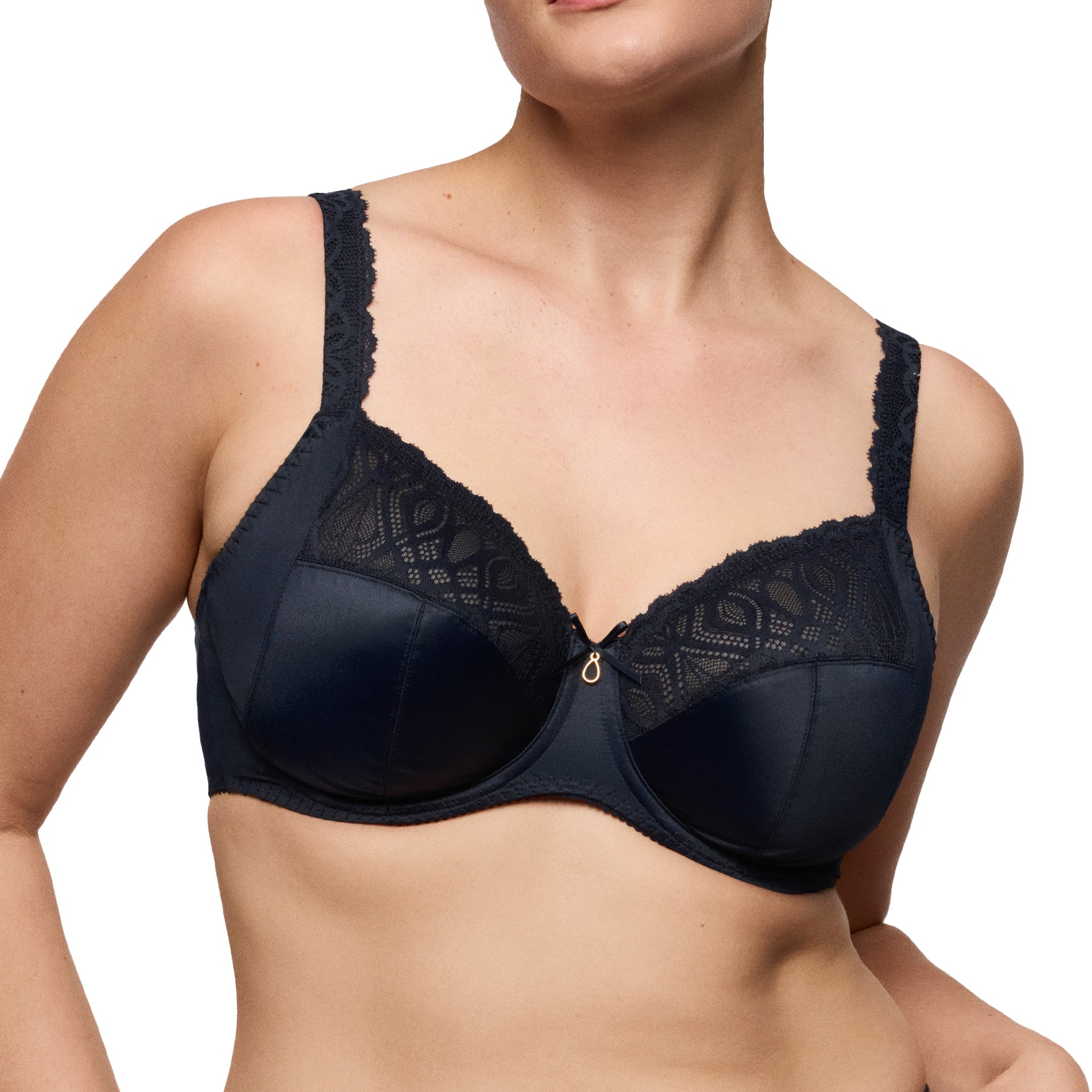 Woman modelling a navy lace full-cup bra with underwire and scalloped straps, front view.
