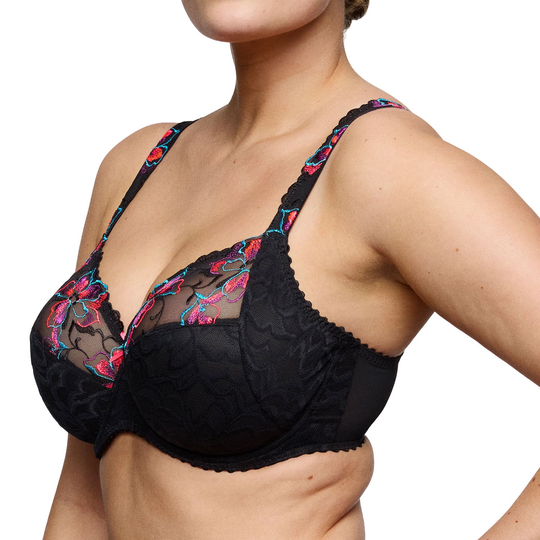 Side view of PrimaDonna Miyara black underwire bra showing supportive cups, floral embroidery and wide side panels.