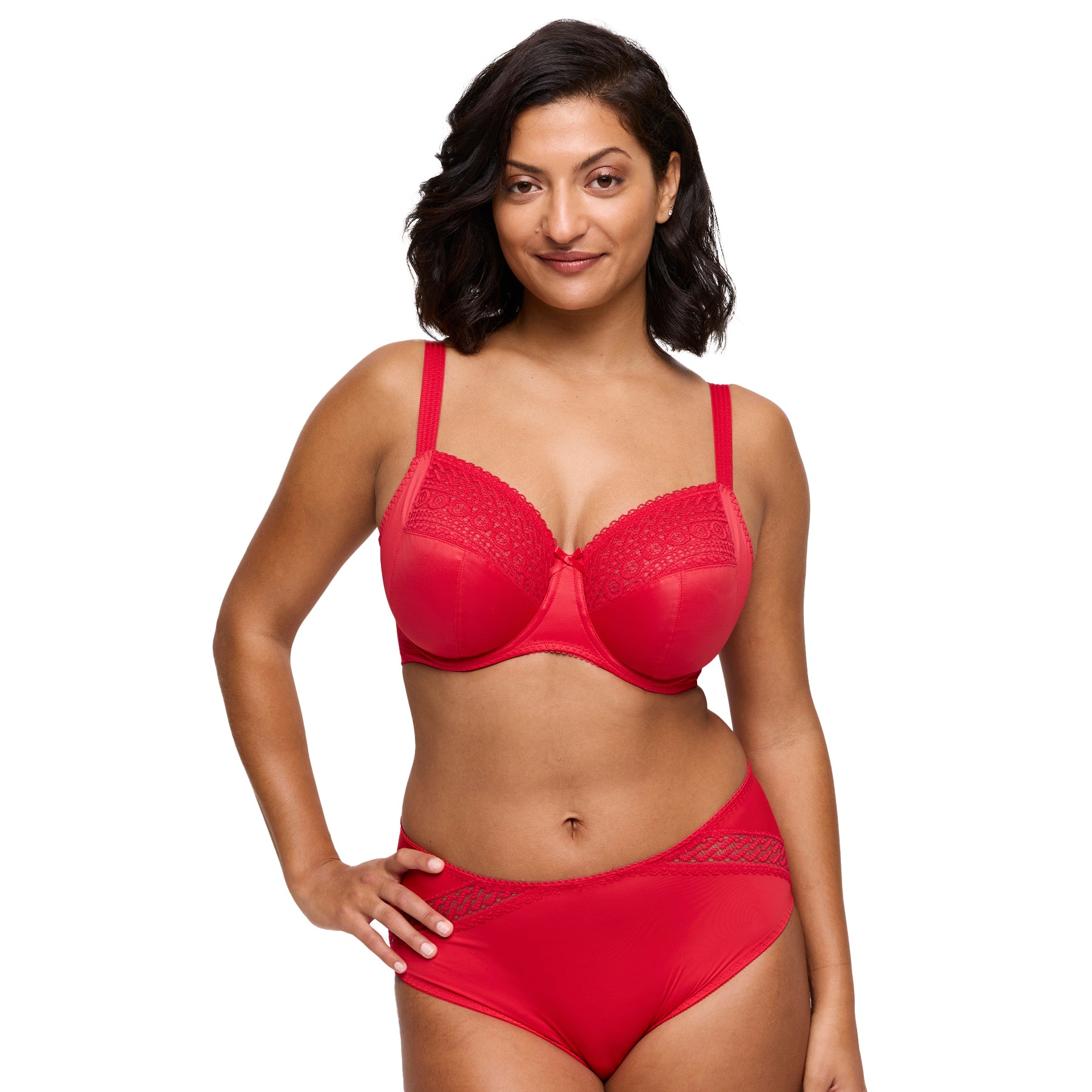 Woman wearing a red full cup bra with lace detailing and matching brief, front view.