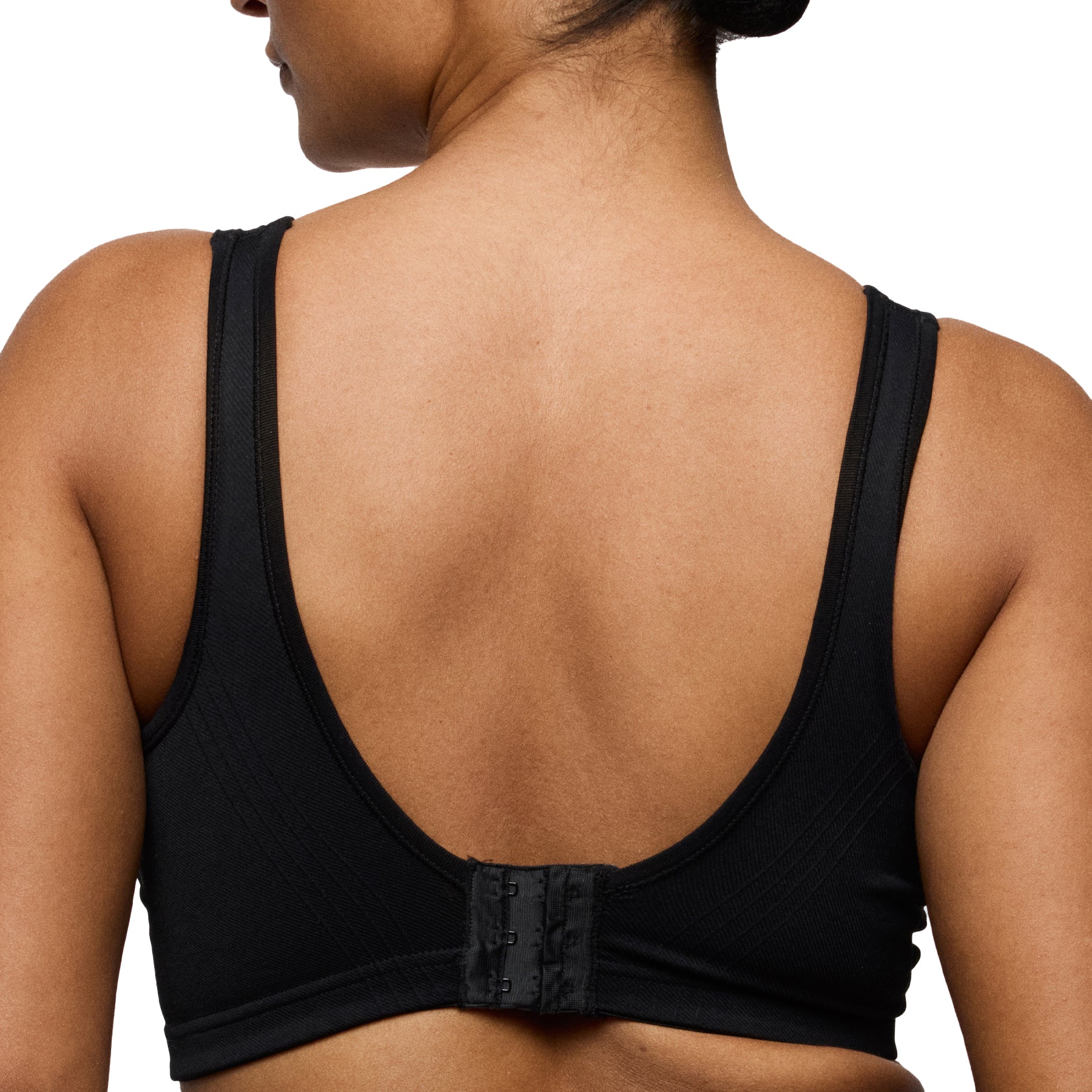 Back view detail of black seamless wireless bra showing wide straps and smoothing back panel