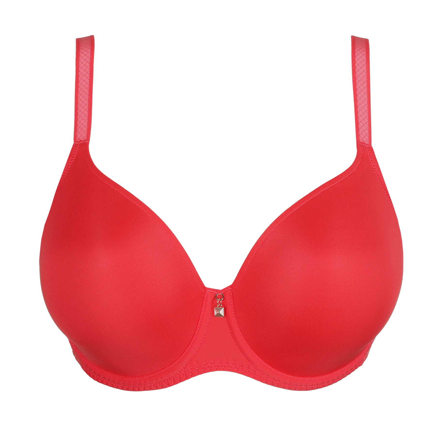 Coral full-coverage bra on white background with smooth moulded cups, underwire support, and a small decorative charm at the centre.