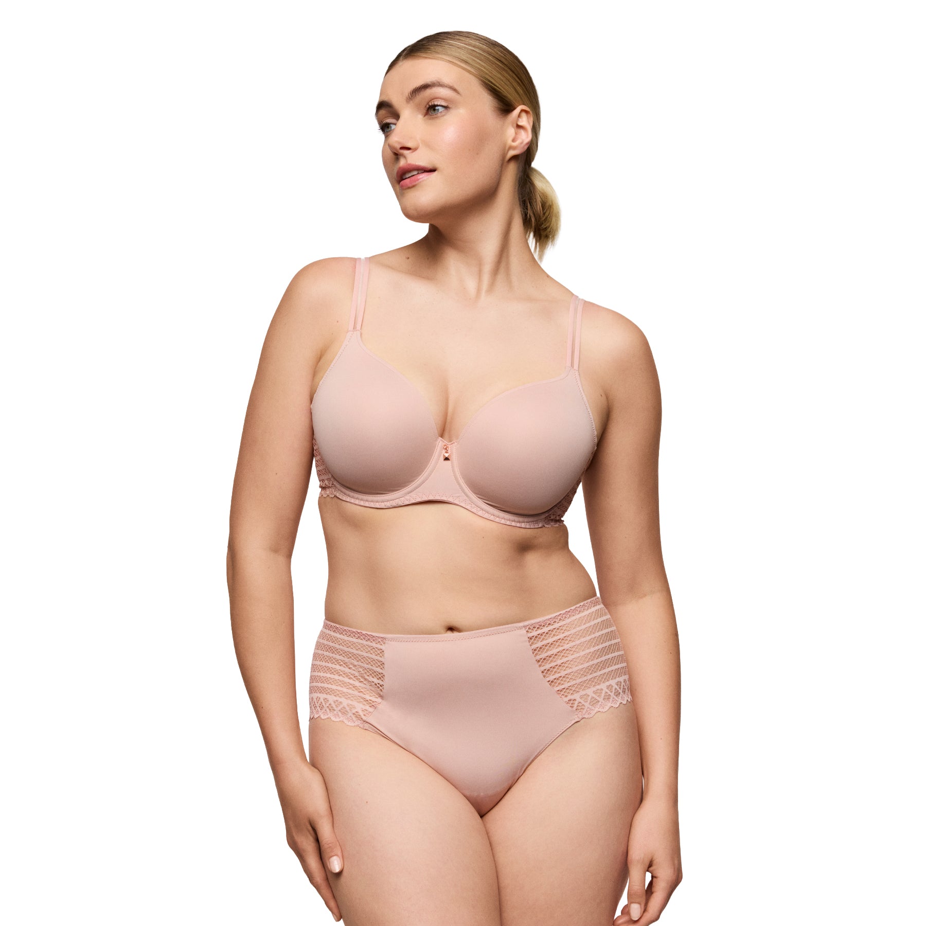 Model wearing powder rose seamless T-shirt bra and matching brief with smooth shaping and invisible finish.