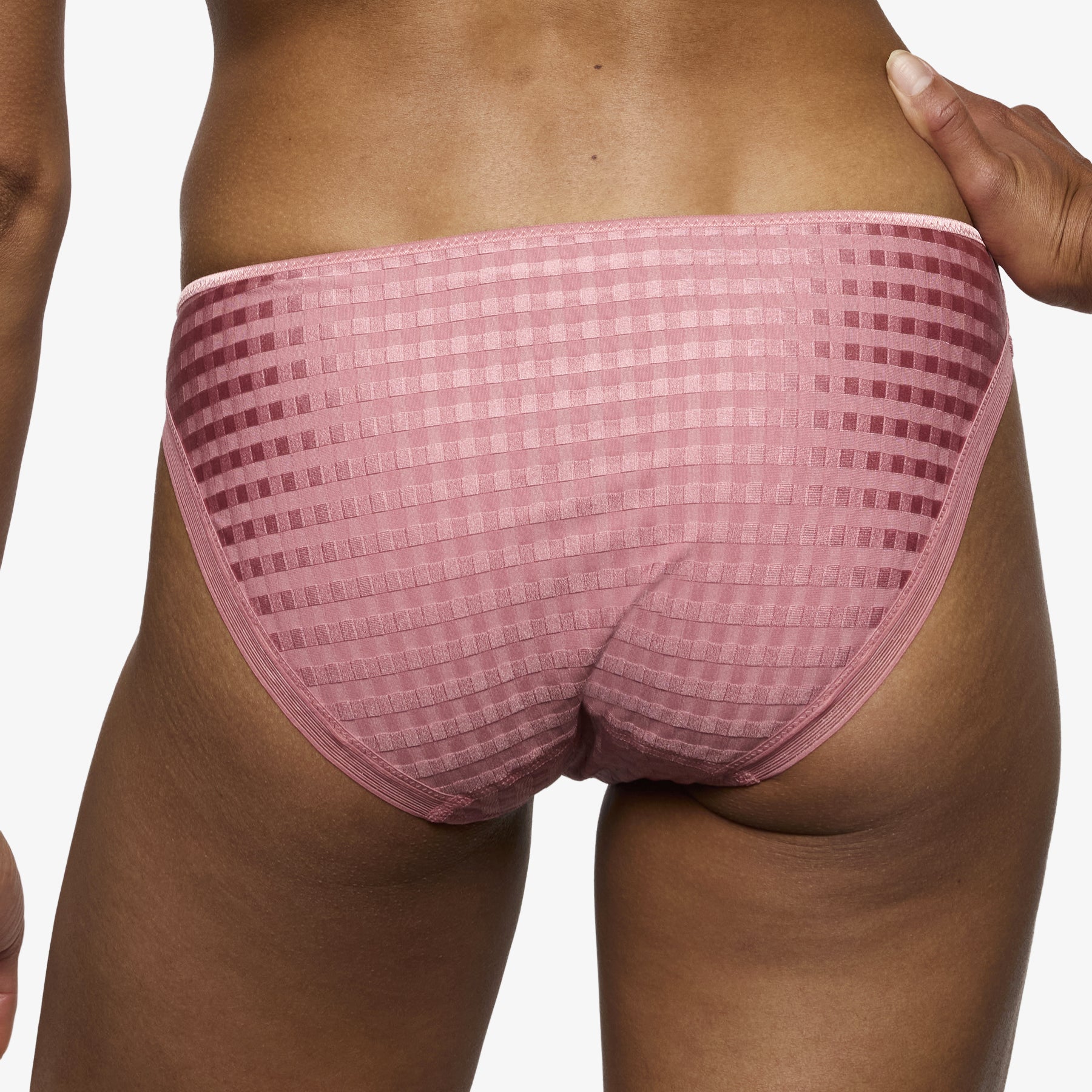 Pink bikini brief angled side view with comfortable fit and lightweight fabric