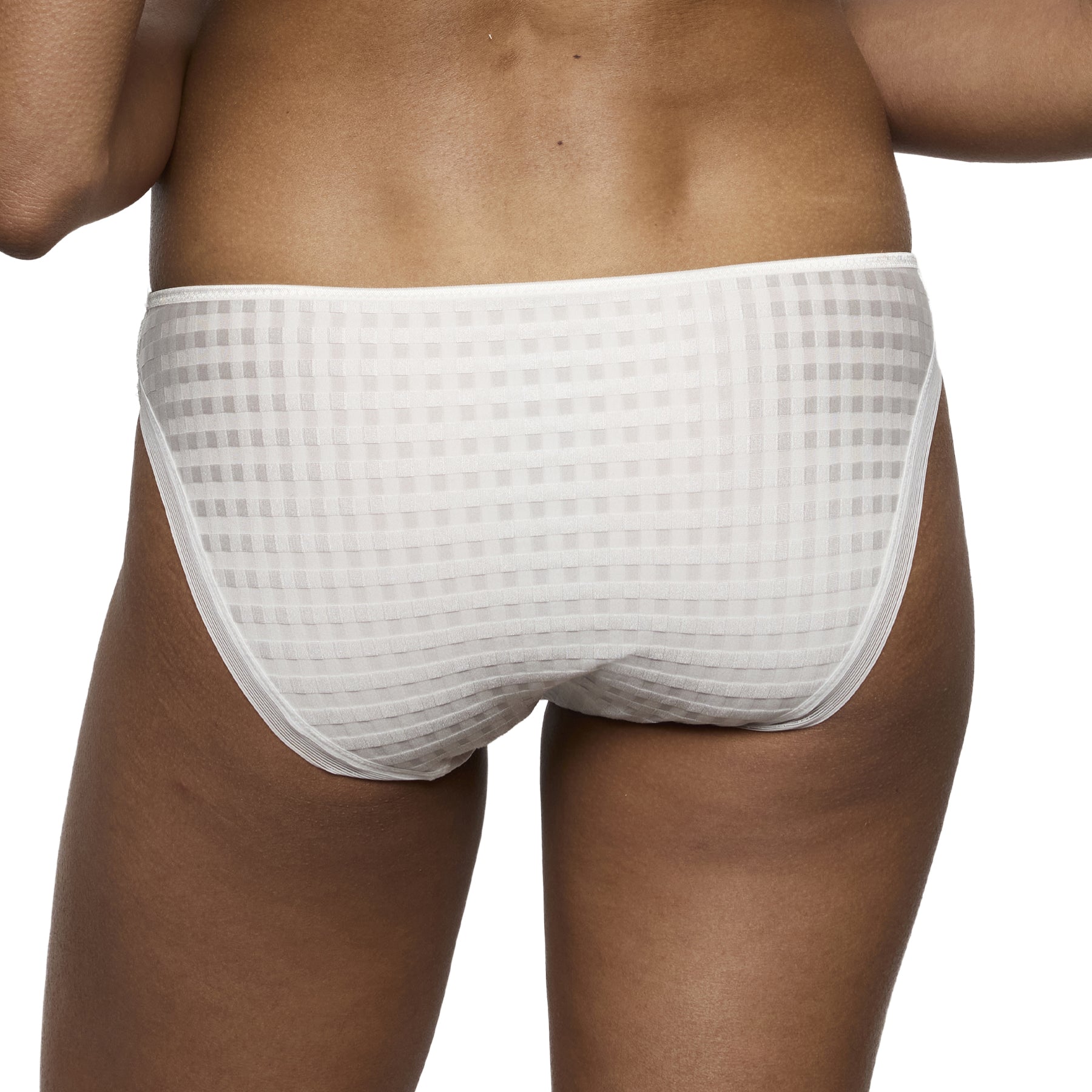 Back view of an ivory brief worn by a model, showing full coverage and a soft check-textured finish.