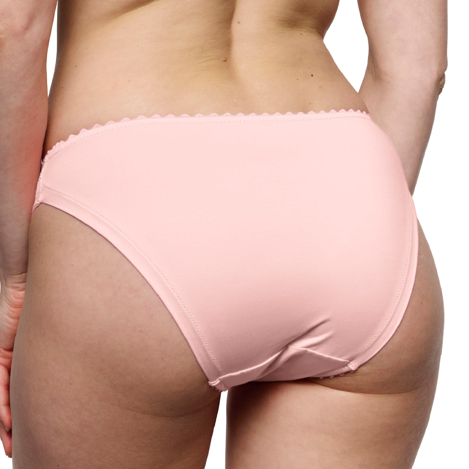 Back view of blush pink bikini briefs with a smooth microfiber back, delicate floral embroidery accents, and scalloped trim.