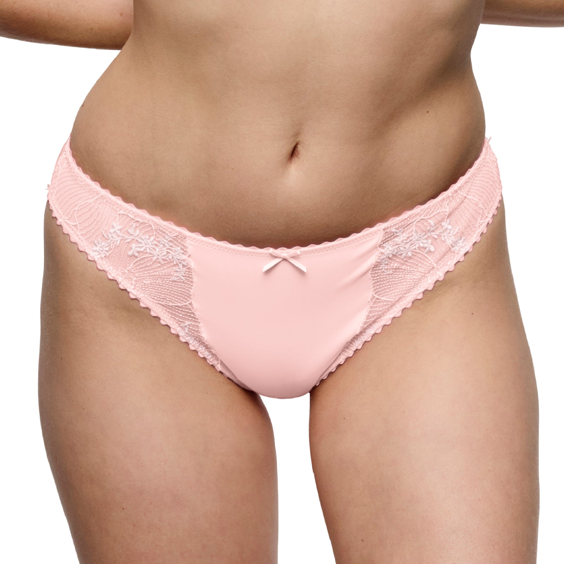 Front view of blush pink bikini briefs with embroidered lace sides, smooth microfiber front panel, and feminine scalloped edging.