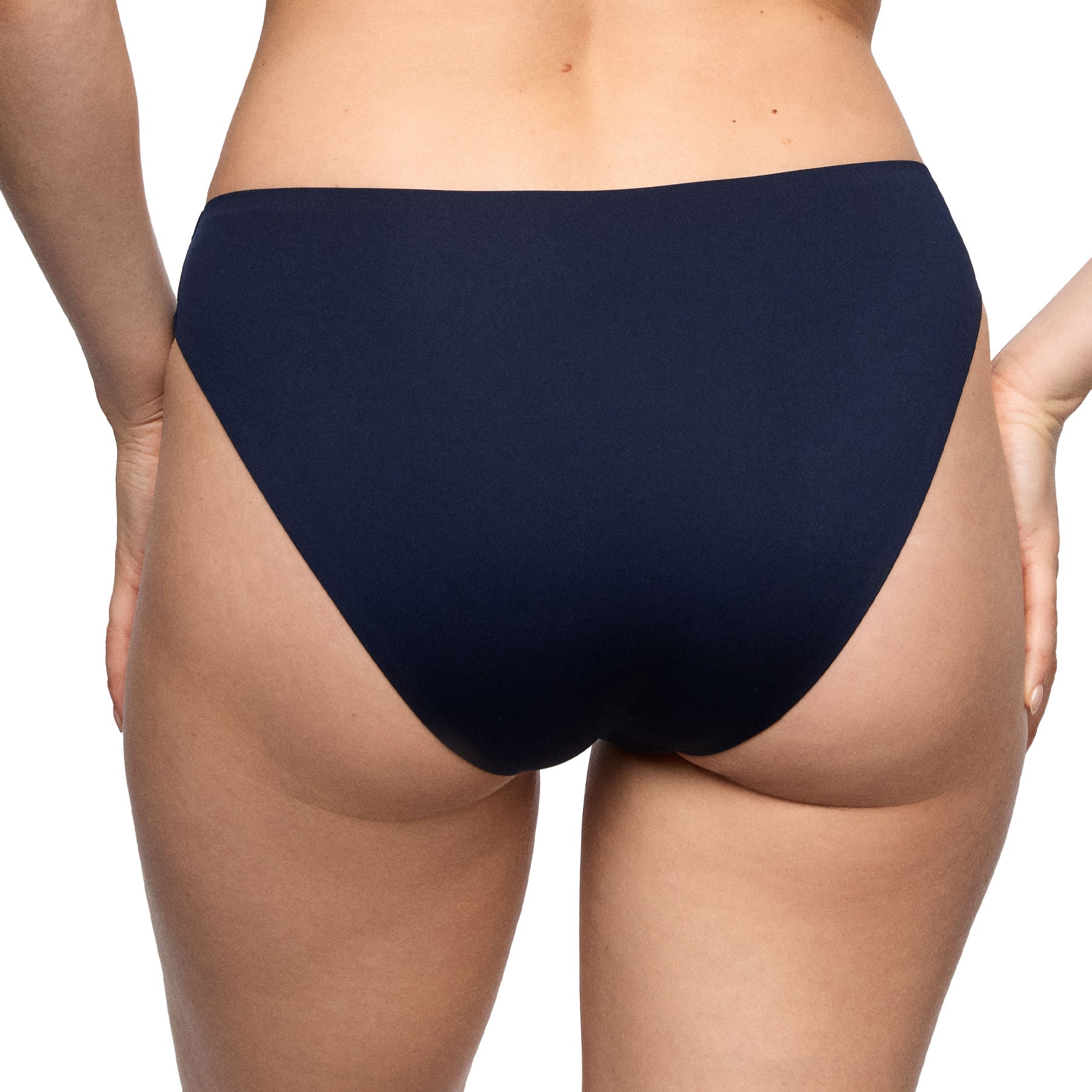 Soft Stretch Rio Brief in Navy with a seamless rear design that lays flat against the body for an invisible look under fitted outfits.