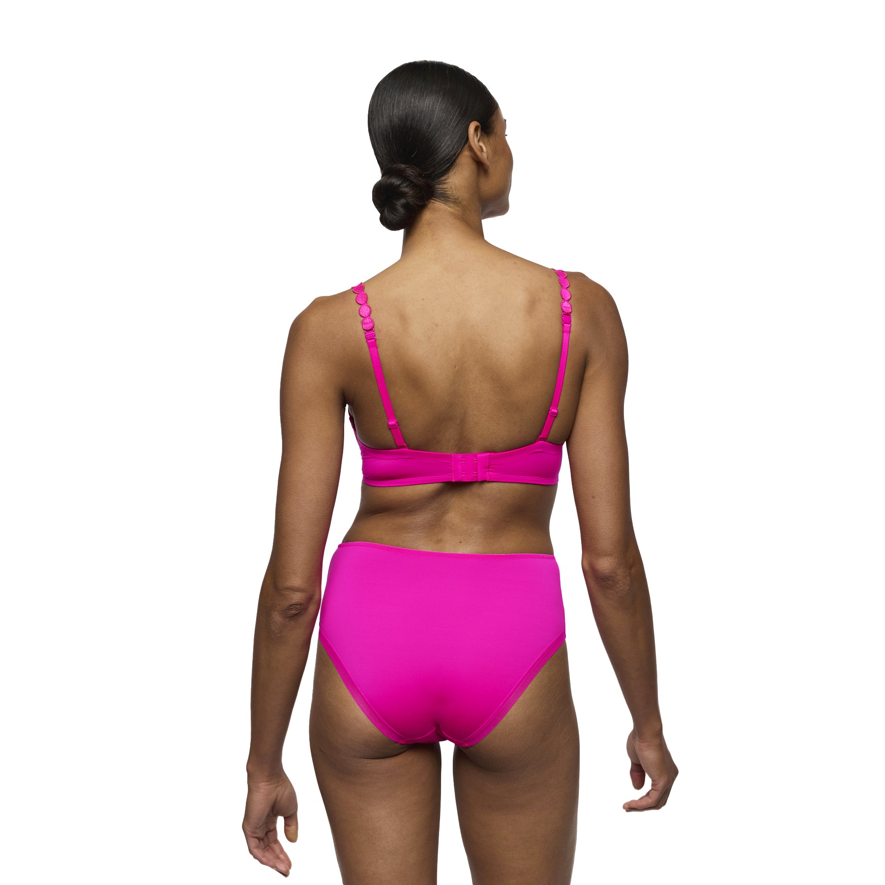 Full back view of influencer pink high-waist brief paired with matching bra, highlighting smooth fit and vibrant colour