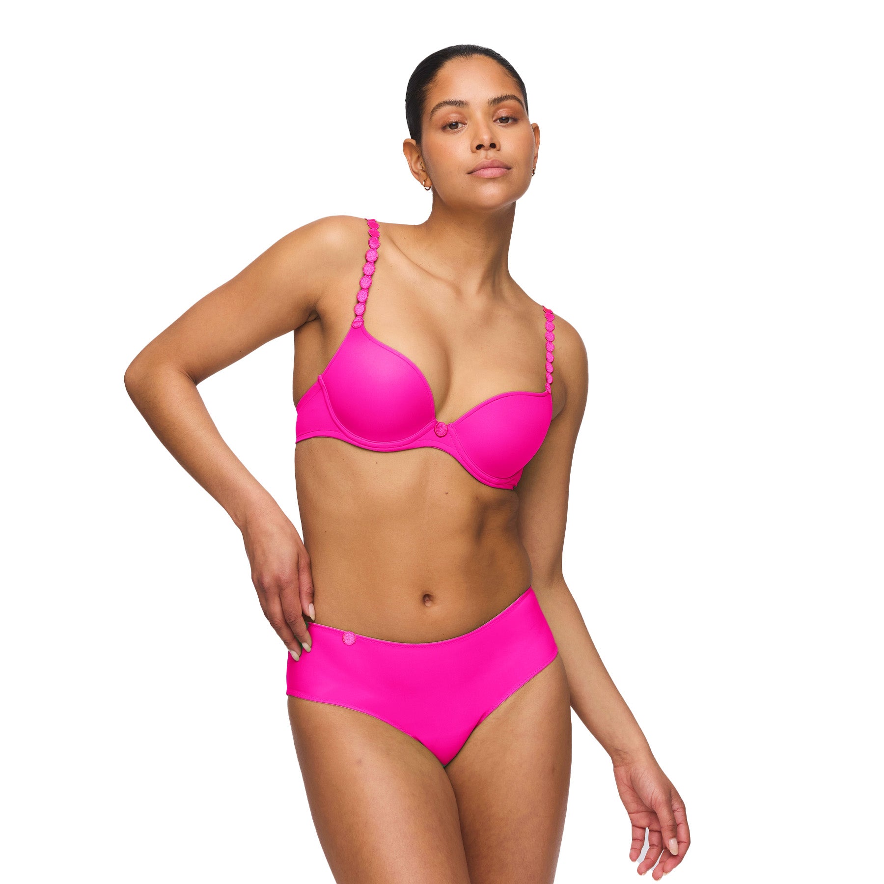 Model wearing influencer pink padded bra and matching hipster brief, showcasing a coordinated vibrant lingerie set