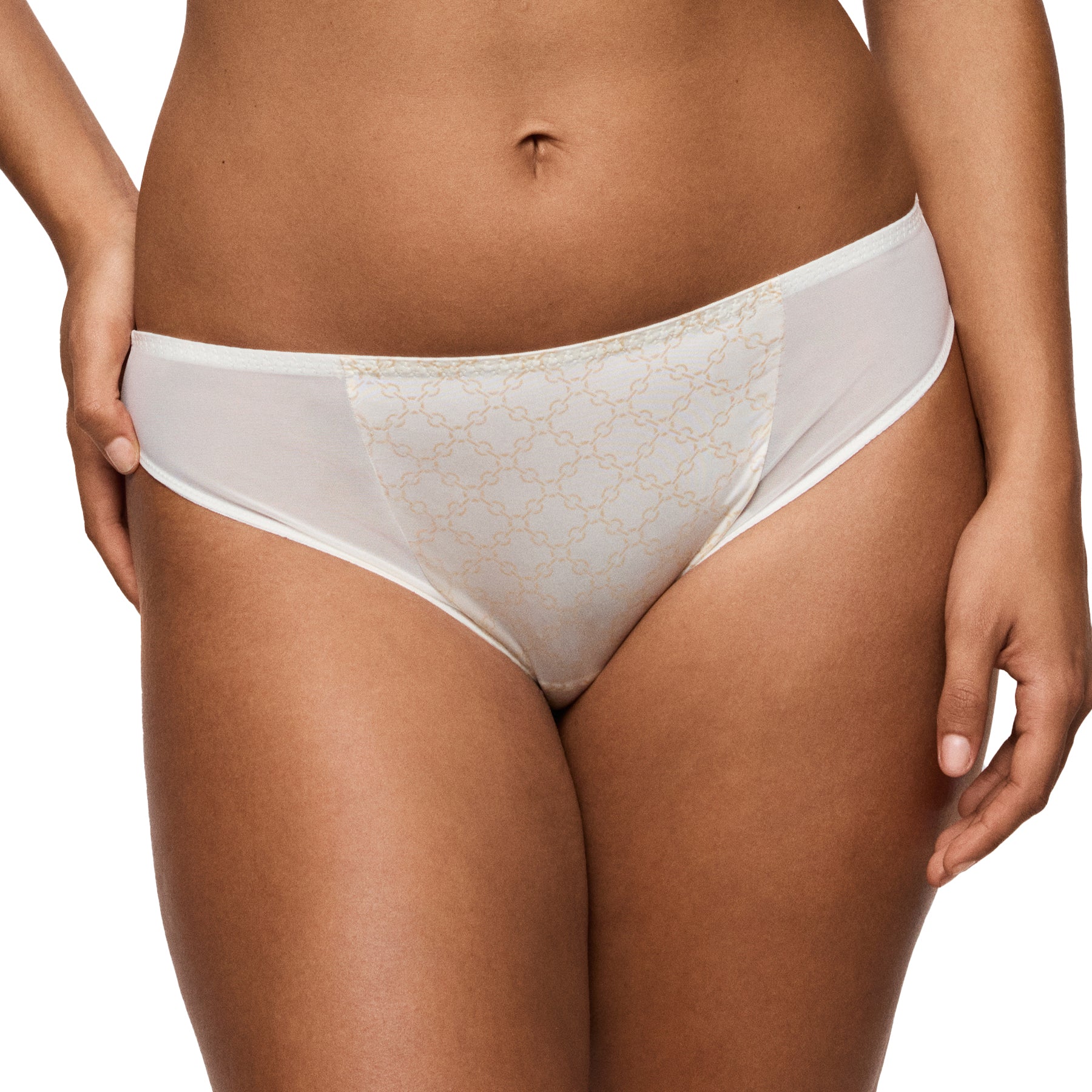 Cream patterned bikini brief on model front view with smooth waistband and no-show design