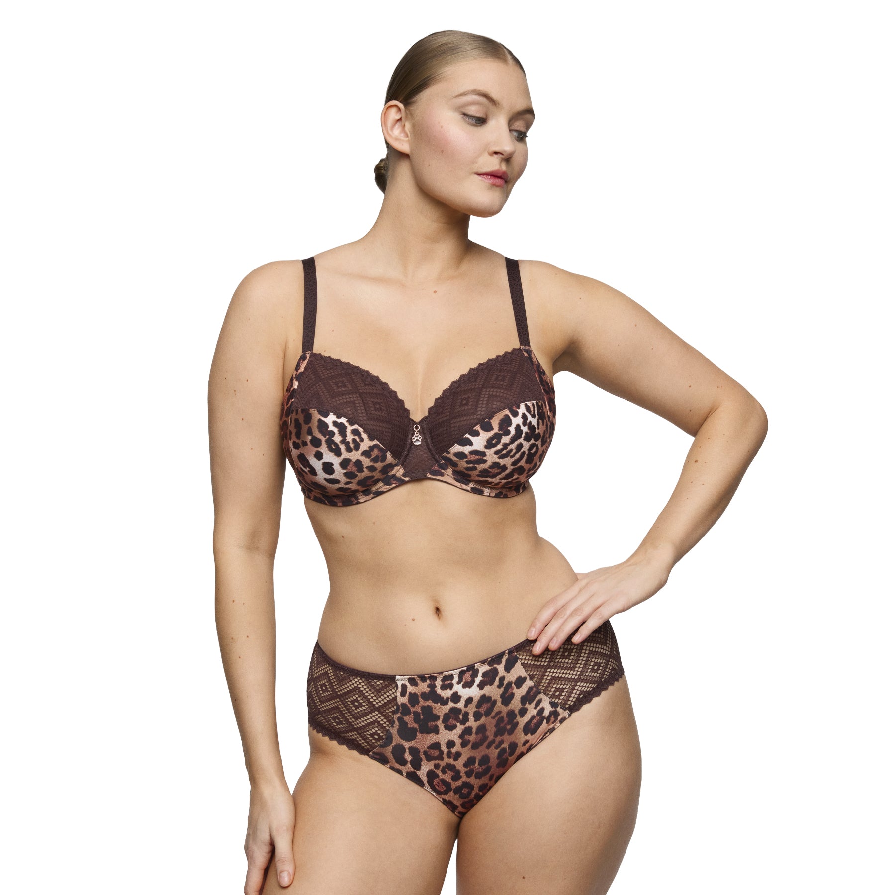 Model wearing a leopard print brief with dark brown geometric lace side panels and matching leopard print bra.