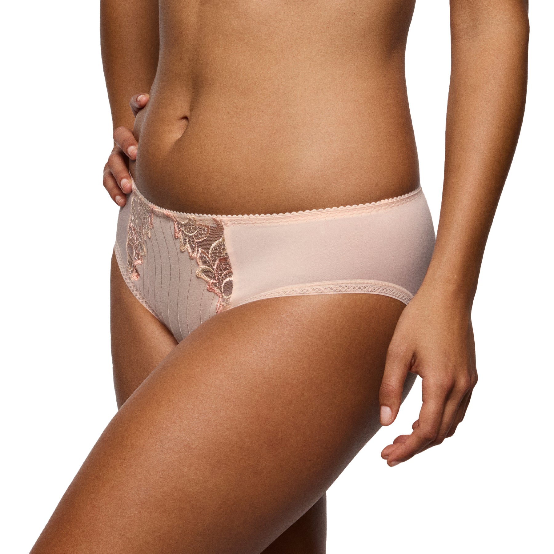 Side view of a nude mid-rise brief on a model, showing the lace panel detail and comfortable, streamlined silhouette.