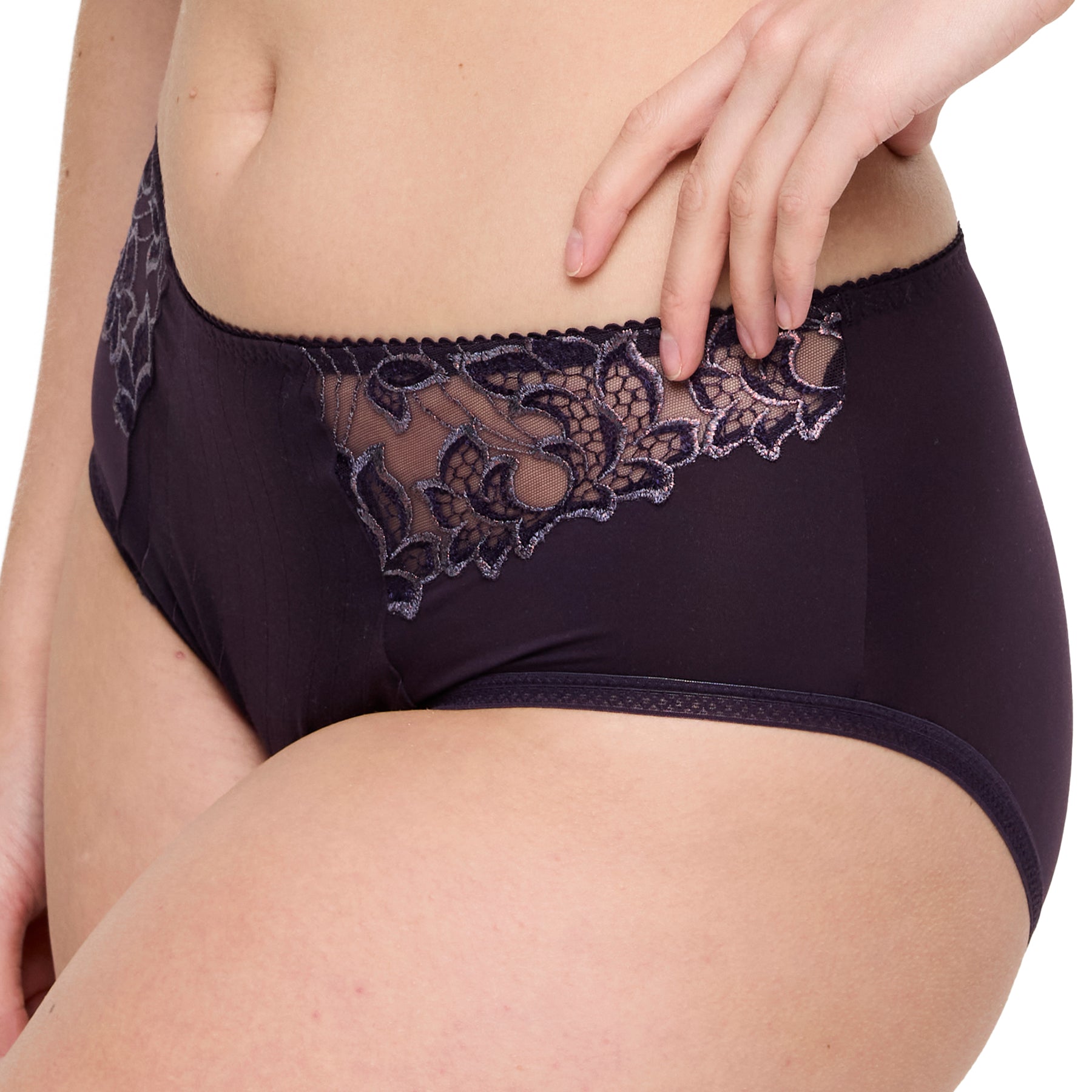 Side view close-up of full brief in plum with floral embroidery and mesh panel.