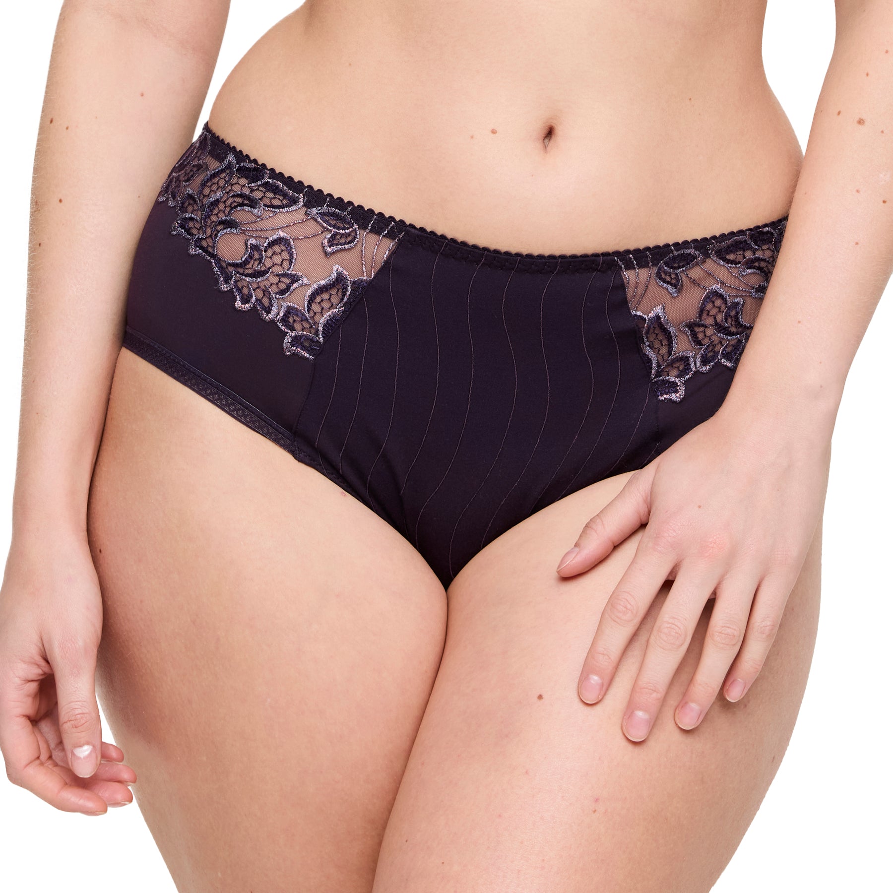 Front close-up of deep plum full brief with sheer floral mesh detailing on both hips.