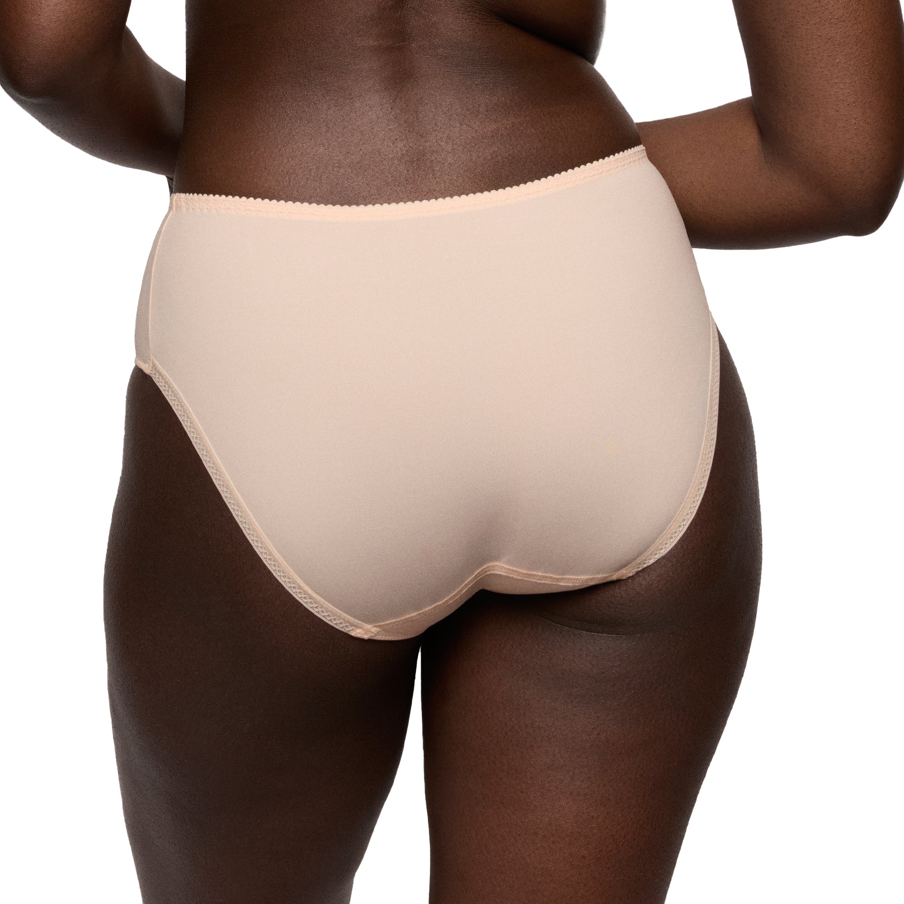 Back view of a nude high-rise full brief with smooth microfibre fabric and clean, seamless edges on a model.