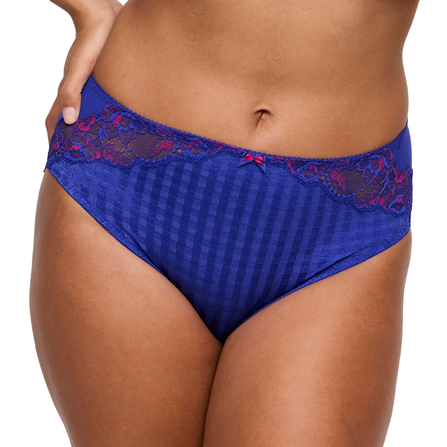 Close-up of woman wearing blue full brief with floral lace trim and a small pink bow.