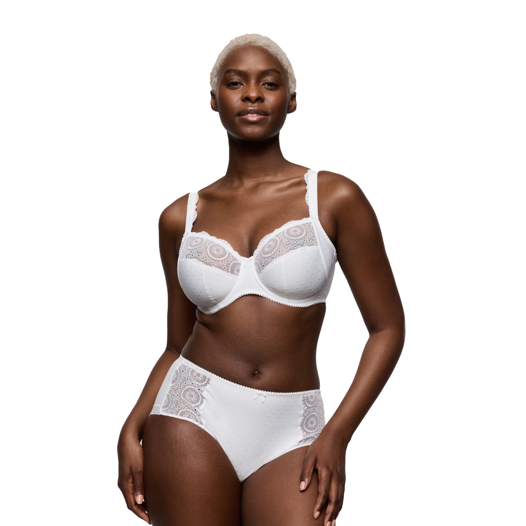 Front view of model in white lace detailed brief style 056-3311 paired with matching embroidered bra.