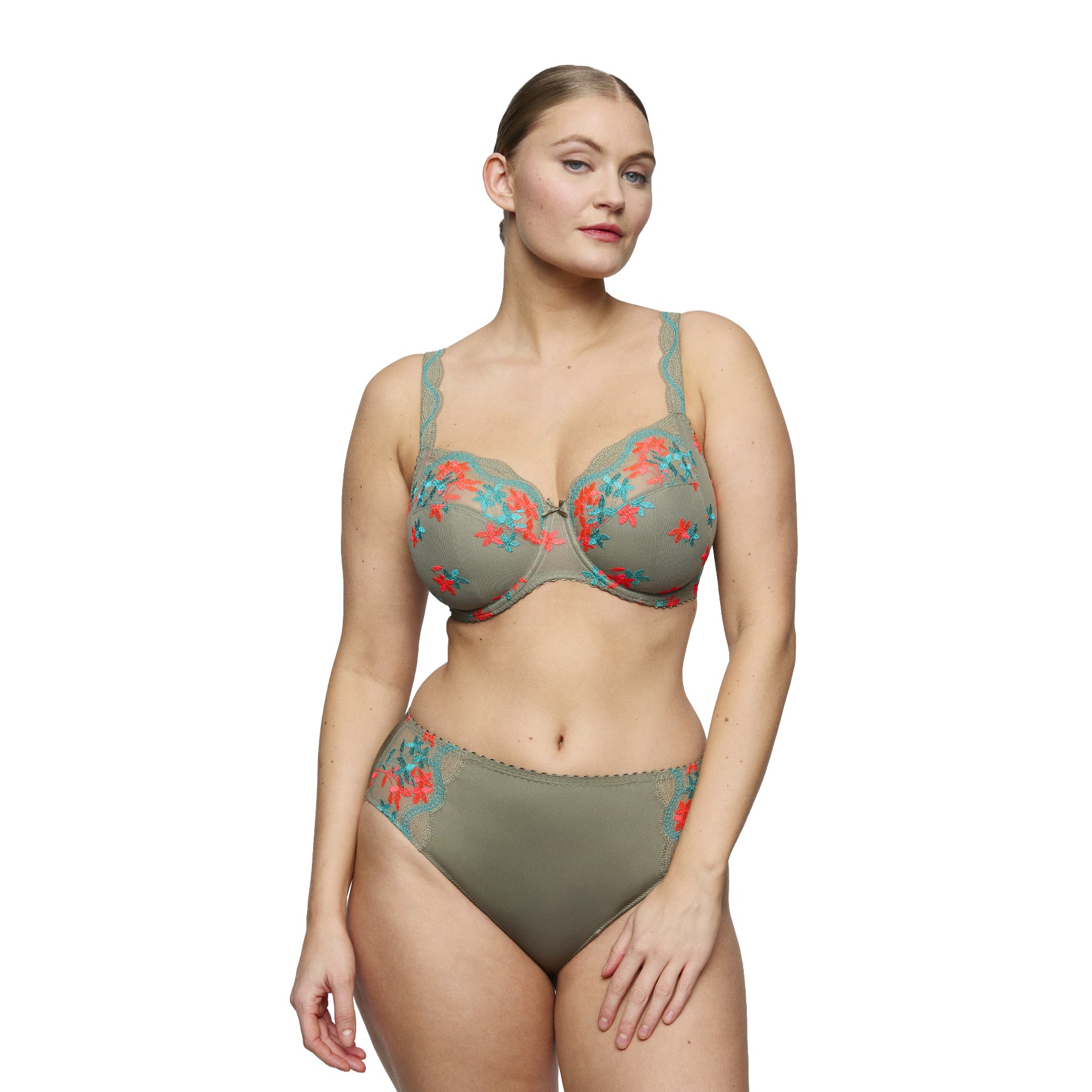 Model wearing PrimaDonna Cala Luna full brief and matching full cup bra in Botanique, featuring vibrant coral and turquoise floral embroidery on a khaki base.