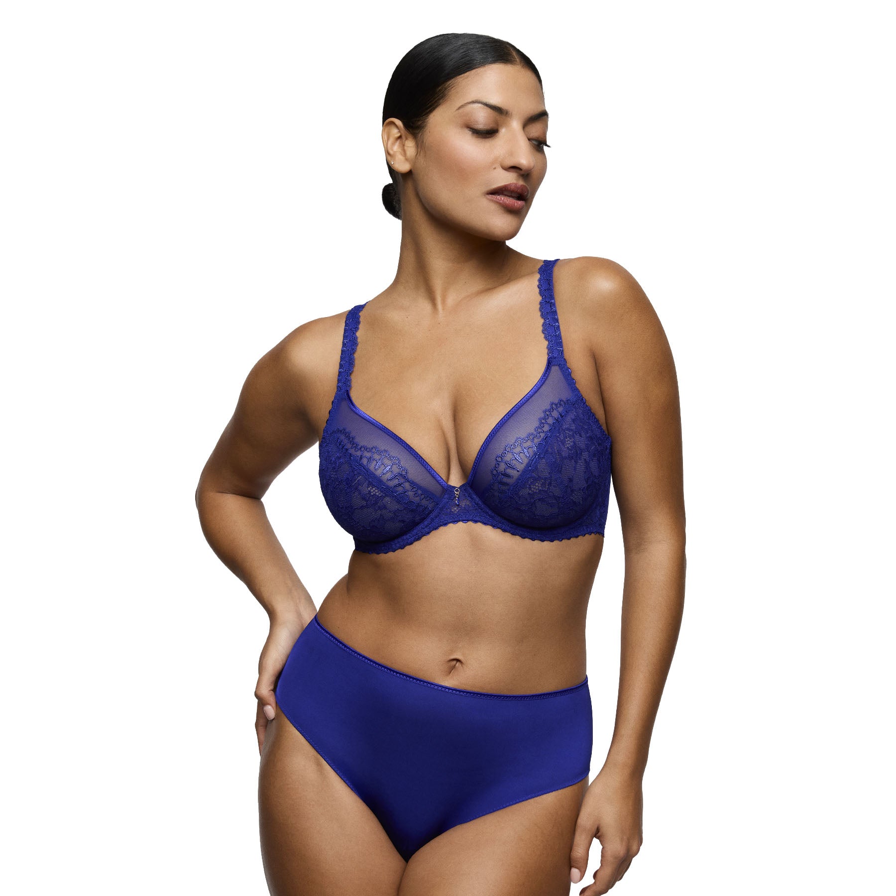 Model wearing the Crazy Blue basic brief with a matching lace bra, showcasing its smooth, comfortable full-coverage fit.