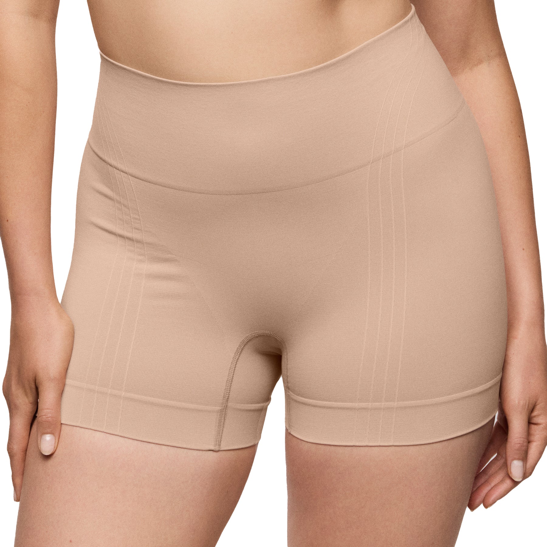 Front view of nude seamless shaper shorts showing high-rise waistband and smooth finish