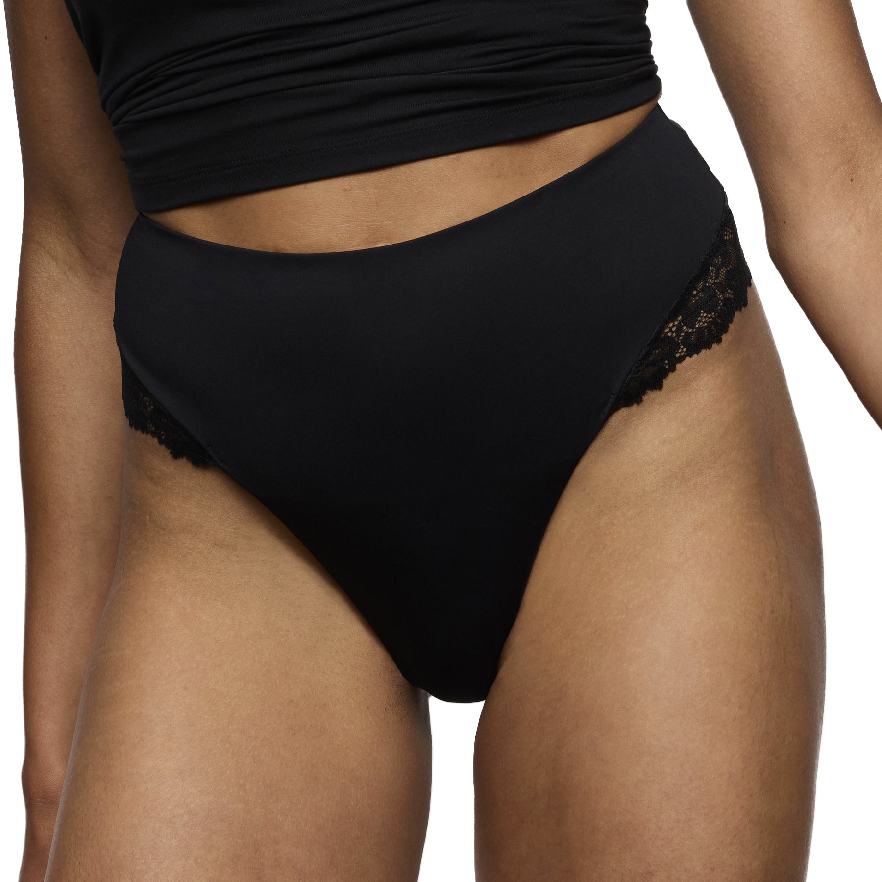 Black high-cut thong with smooth front panel and lace side details worn with matching top