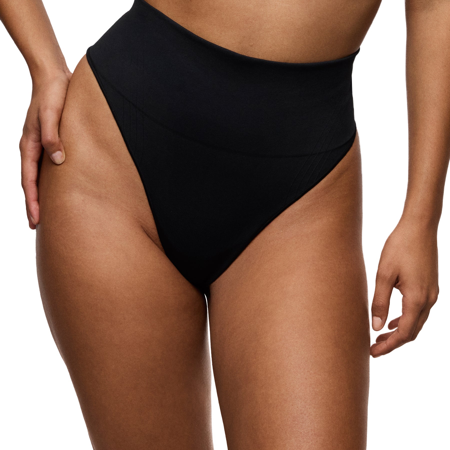 Black high-waisted bikini bottom on a person against a white background