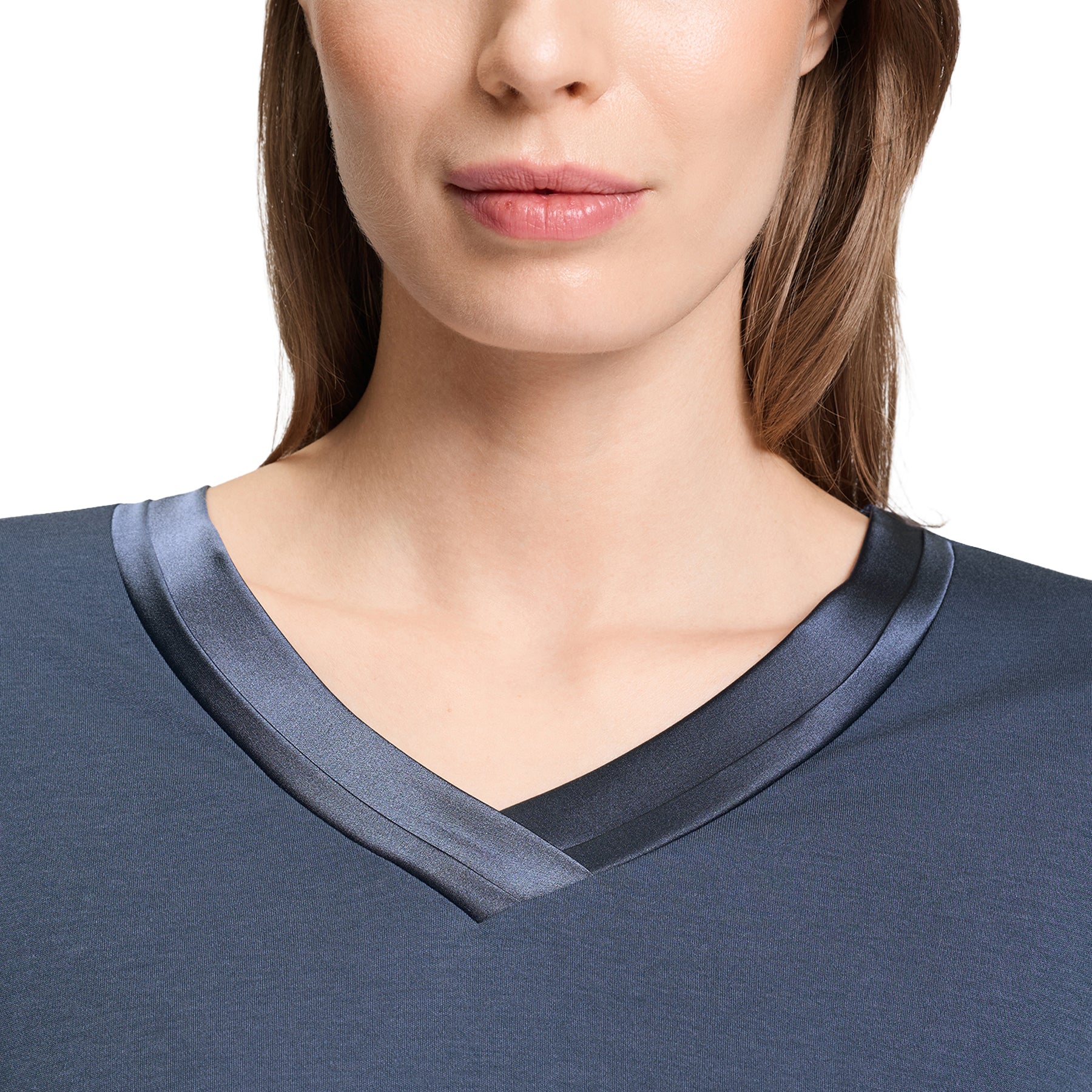 Close-up of a blue long-sleeve nightgown featuring an elegant satin-trimmed V-neckline.