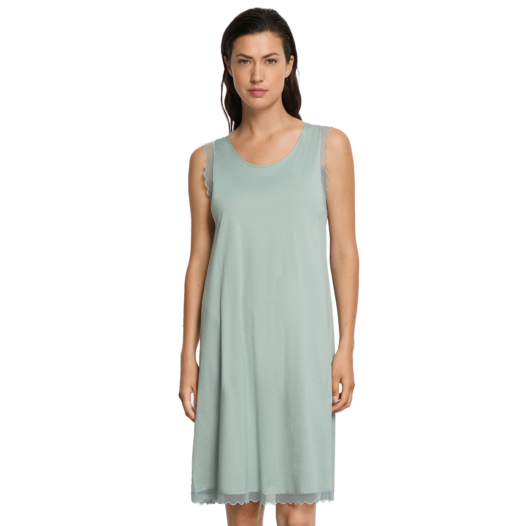Woman wearing sage green sleeveless nightgown with lace trim and relaxed fit, soft drape silhouette